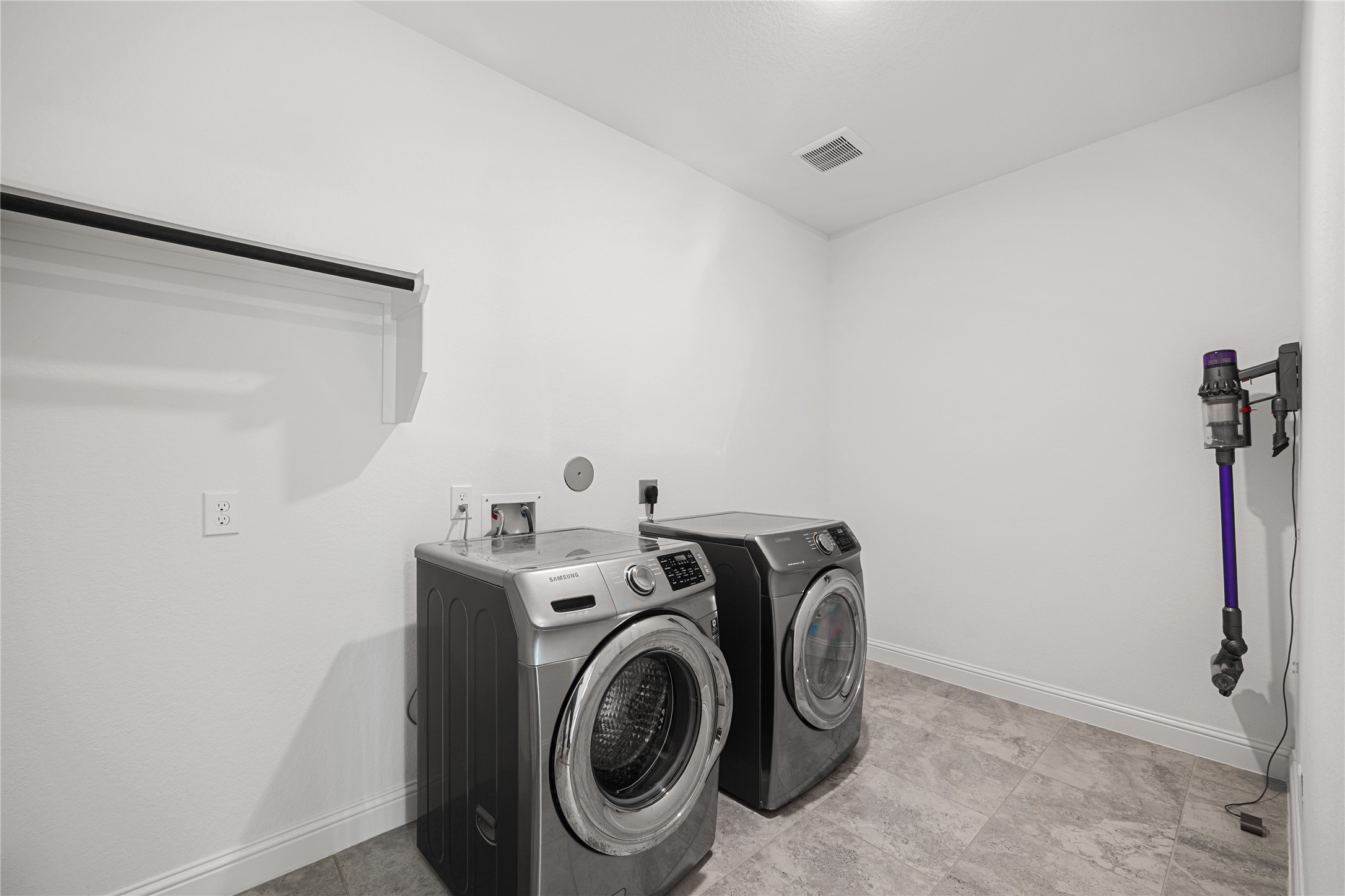Spacious laundry room ready for you to customize.