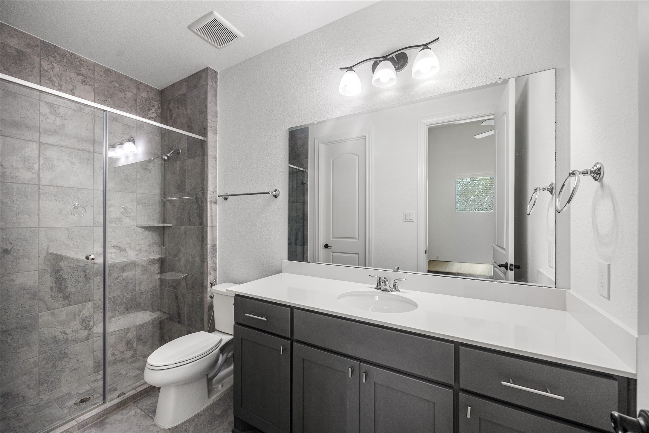 Ensuite bath with walk-in shower.