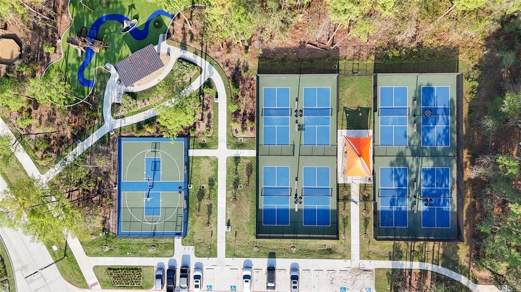 Pickleball and Basketball courts with a local park.
