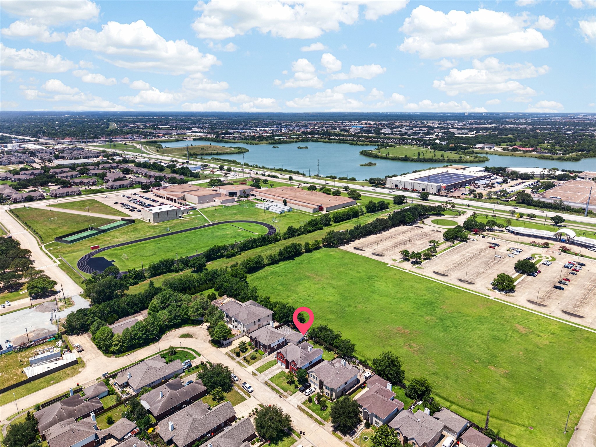 Beyond the nearby community lake, the property offers easy access to major highways, ensuring a lifestyle of both convenience and recreation for the whole family.
