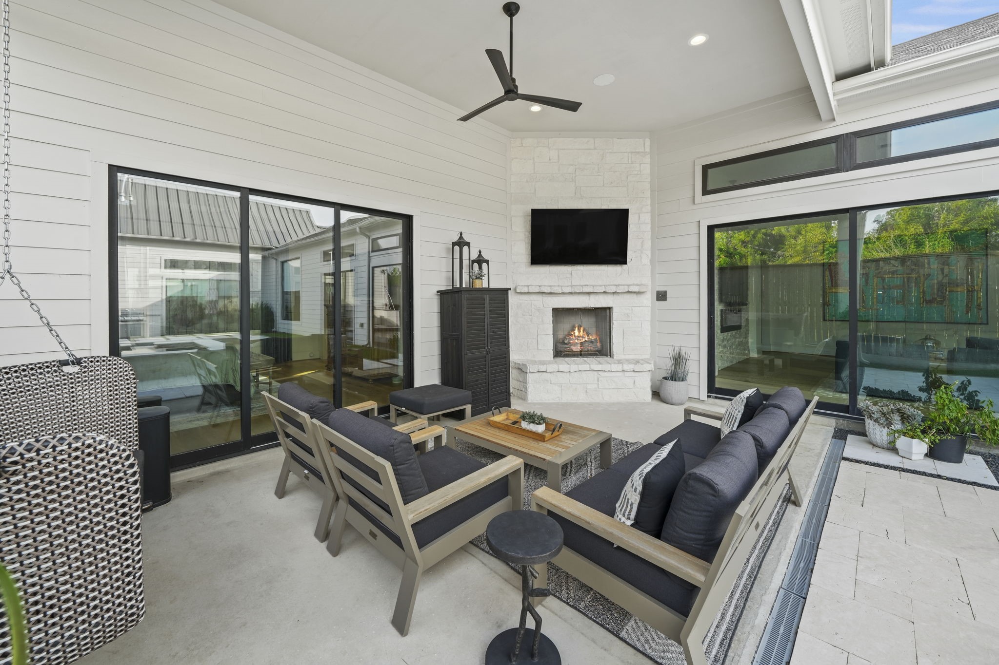 The outdoor entertaining space with fireplace adds yet another living space to this beautiful home!