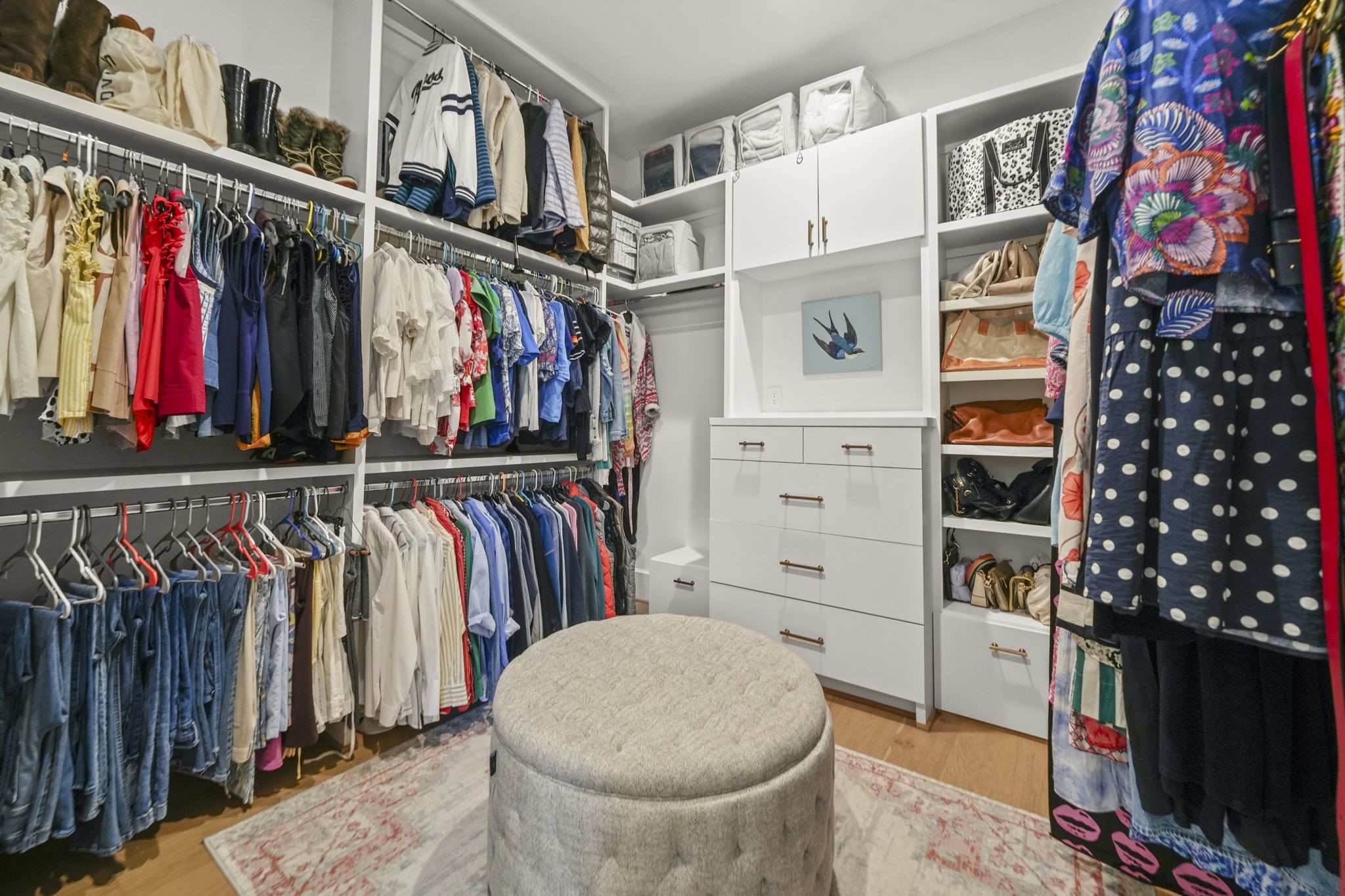 The primary closet has a custom built ins!