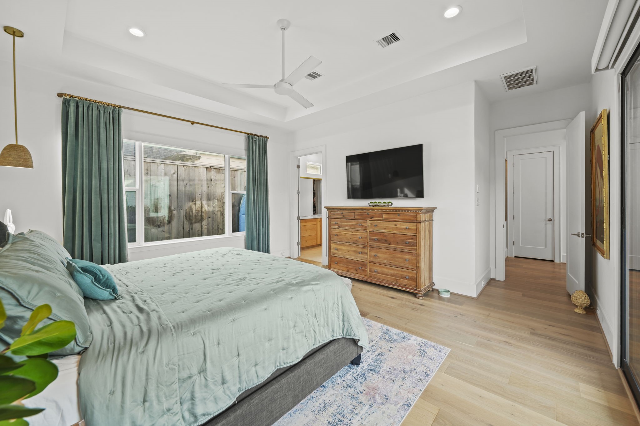 The primary is tucked away in the home providing a great space to unwind.