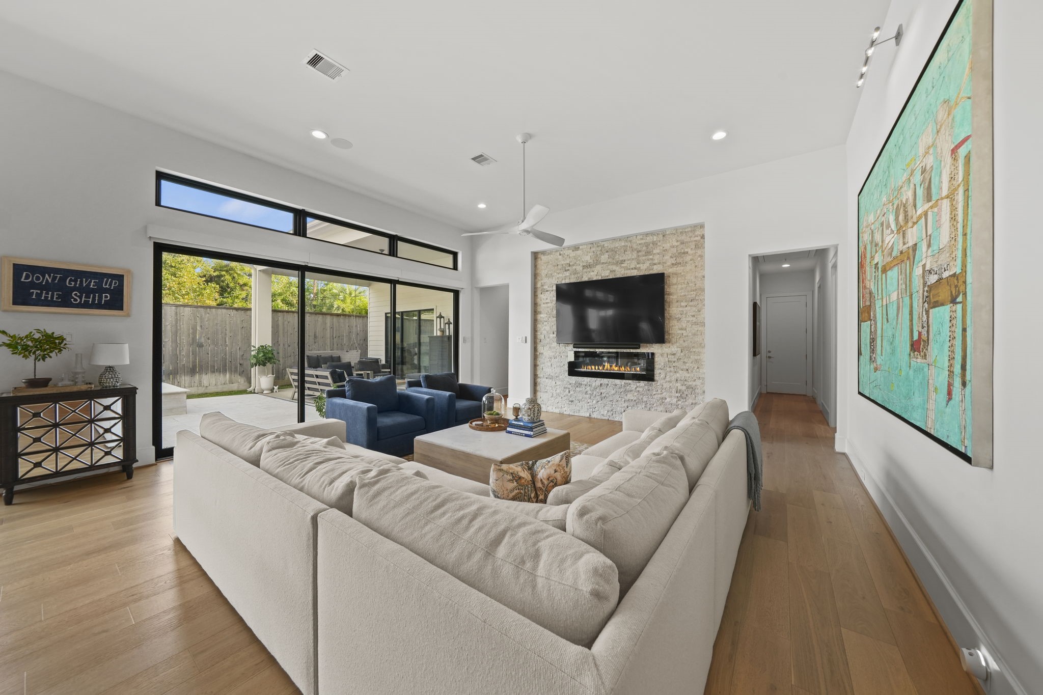 The family room is another room that is open to the backyard entertaining space!