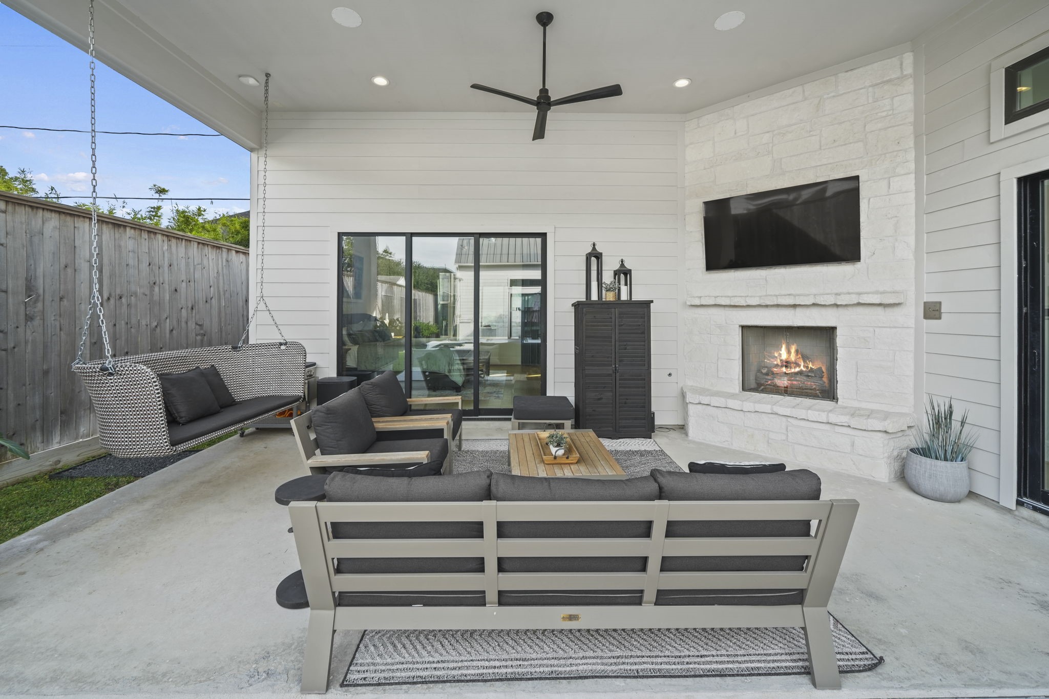 The outdoor living space is accessible from the primary bedroom and family room spaces!