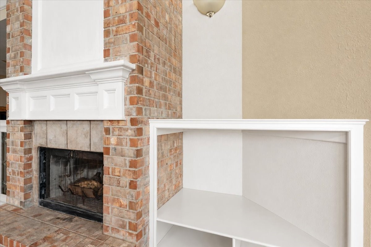 Stunning brick fireplace with built ins