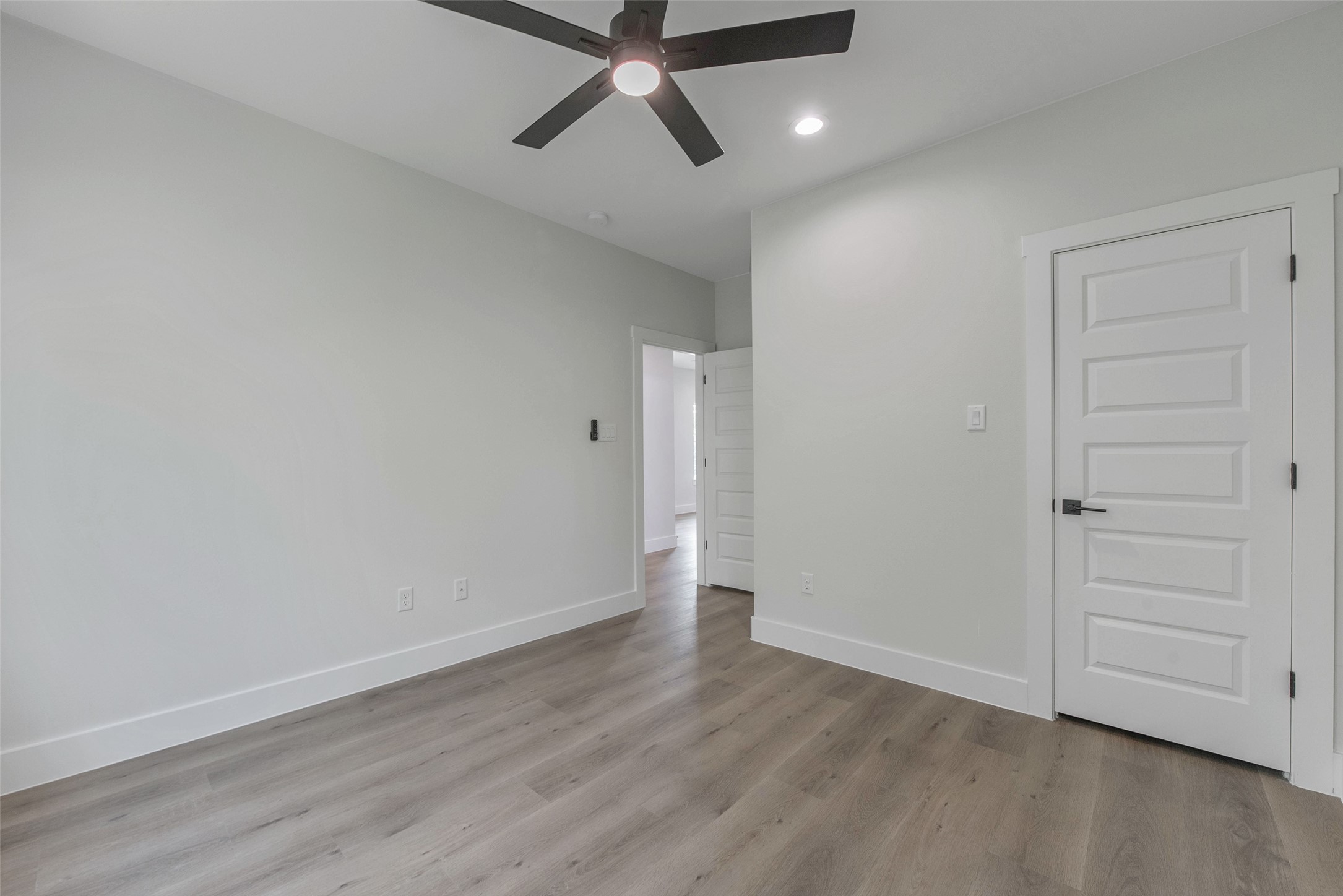 The third bedroom features a closet and a bright, comfortable layout with a clean, modern finish.