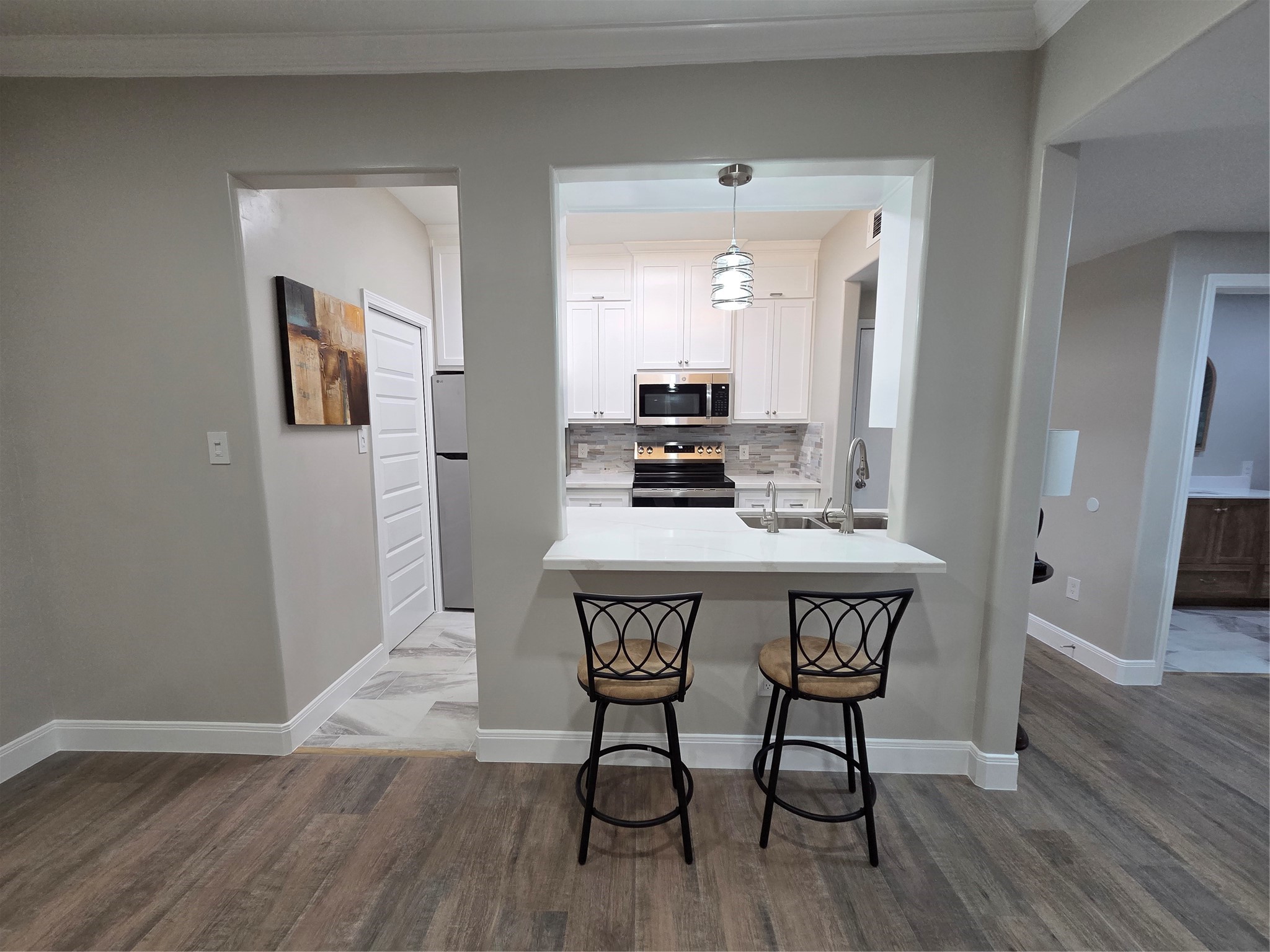 Another view of kitchen from dining room.