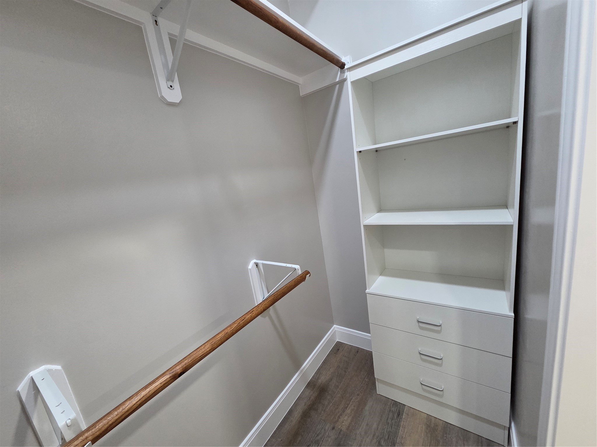 Closet also comes with attached added drawers and shelfing