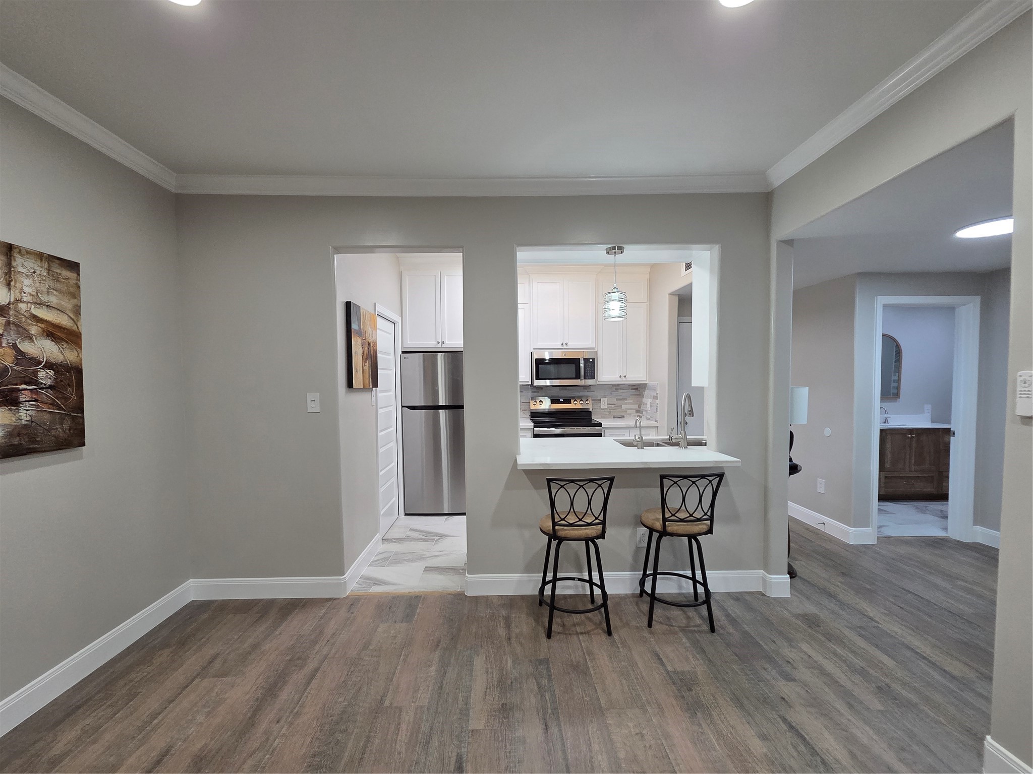 Another view of kitchen from den room.