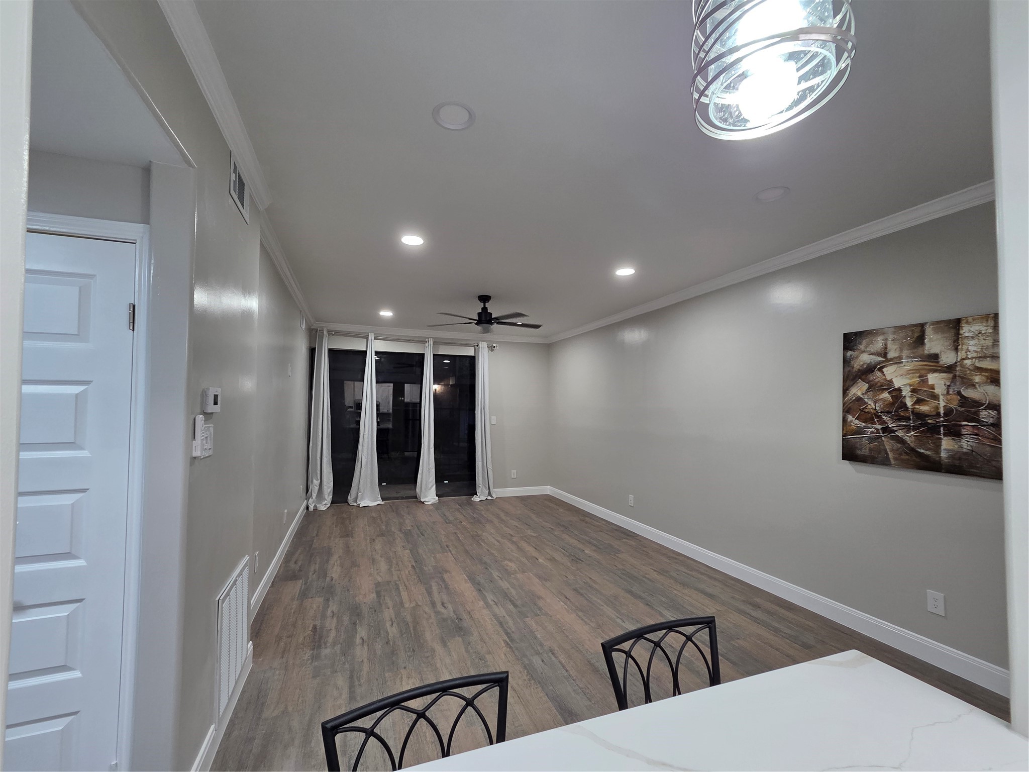 View of both dining and living from kithcen