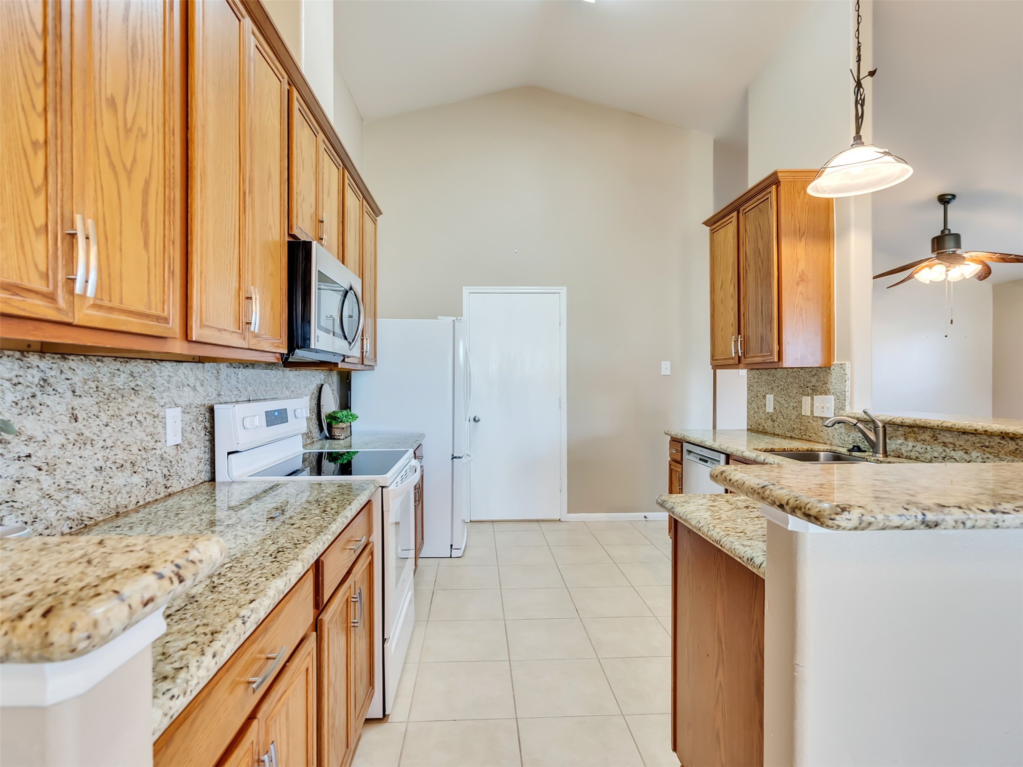 Beautiful granite counters will please the family chef.