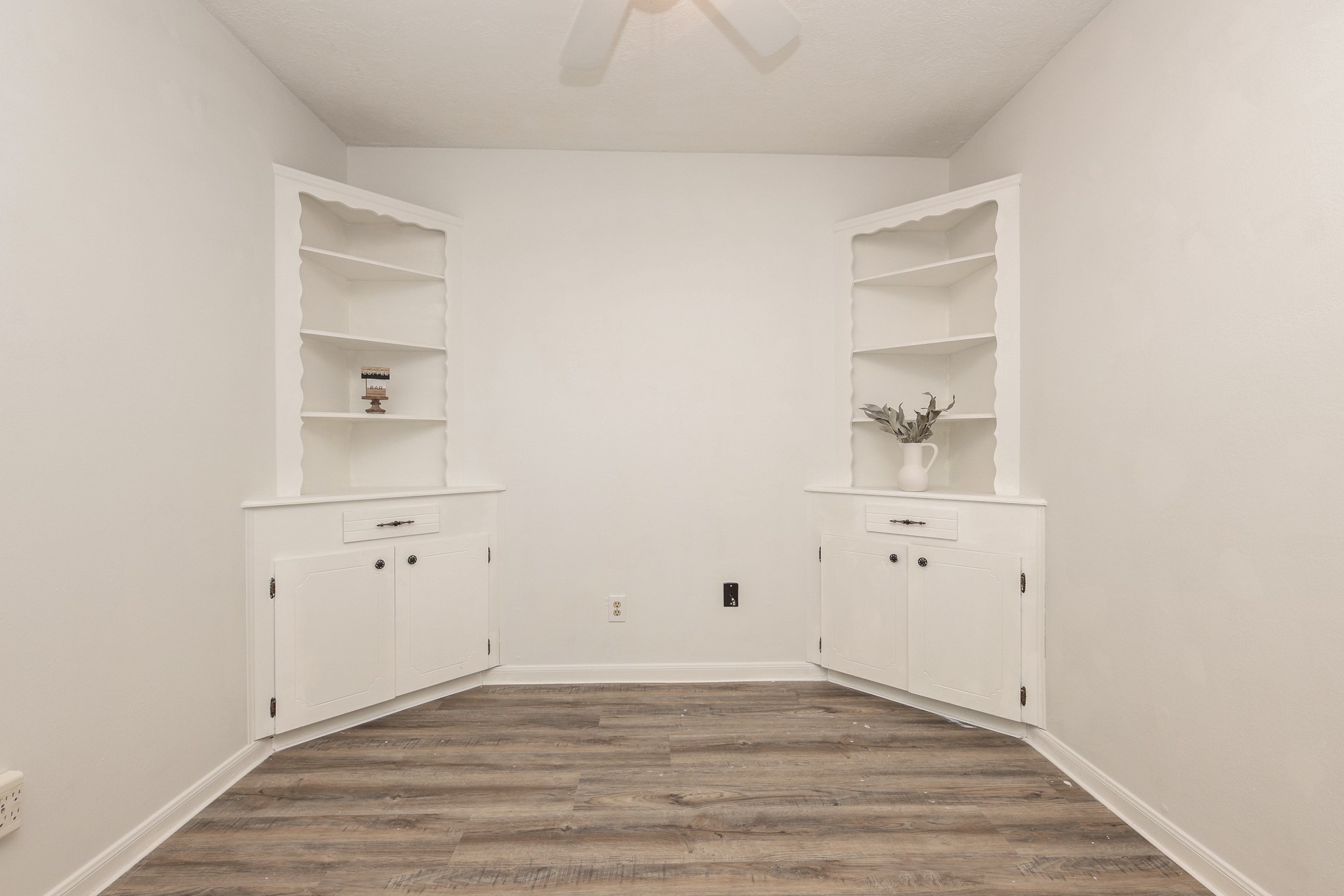 Formal Dining with built-in shelving and cabinetry