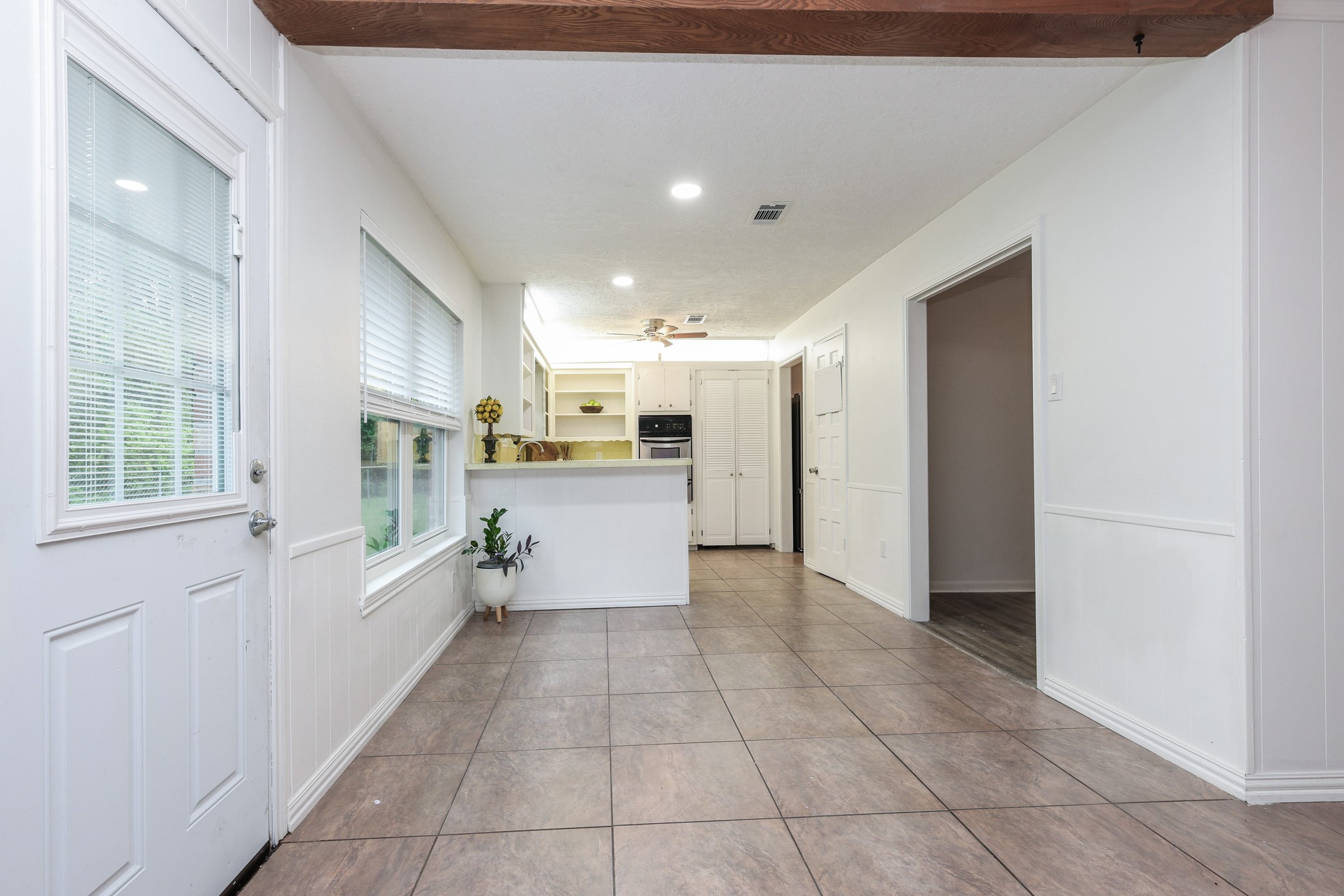 Breakfast Nook and integrated mini blind backyard door with slider control. Breakfast Nook and integrated mini blind backyard door with slider control.