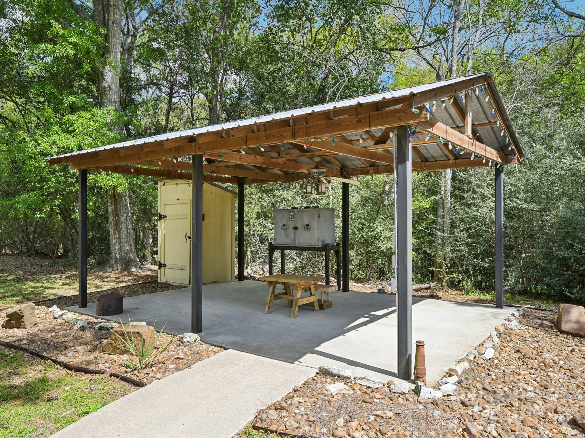 The covered BBQ area is the focal point of your outside fun.