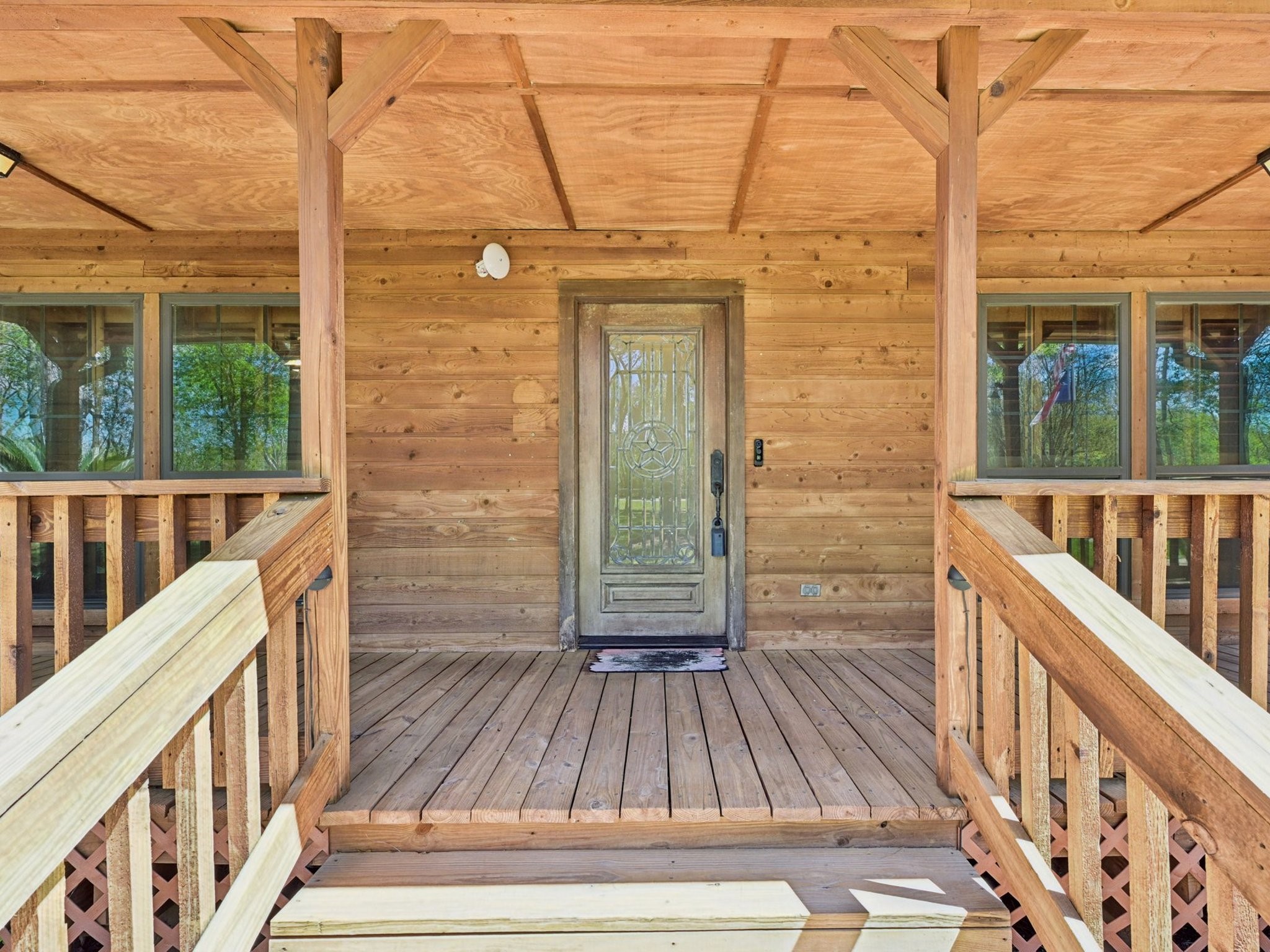 The covered front porch will beckon you.