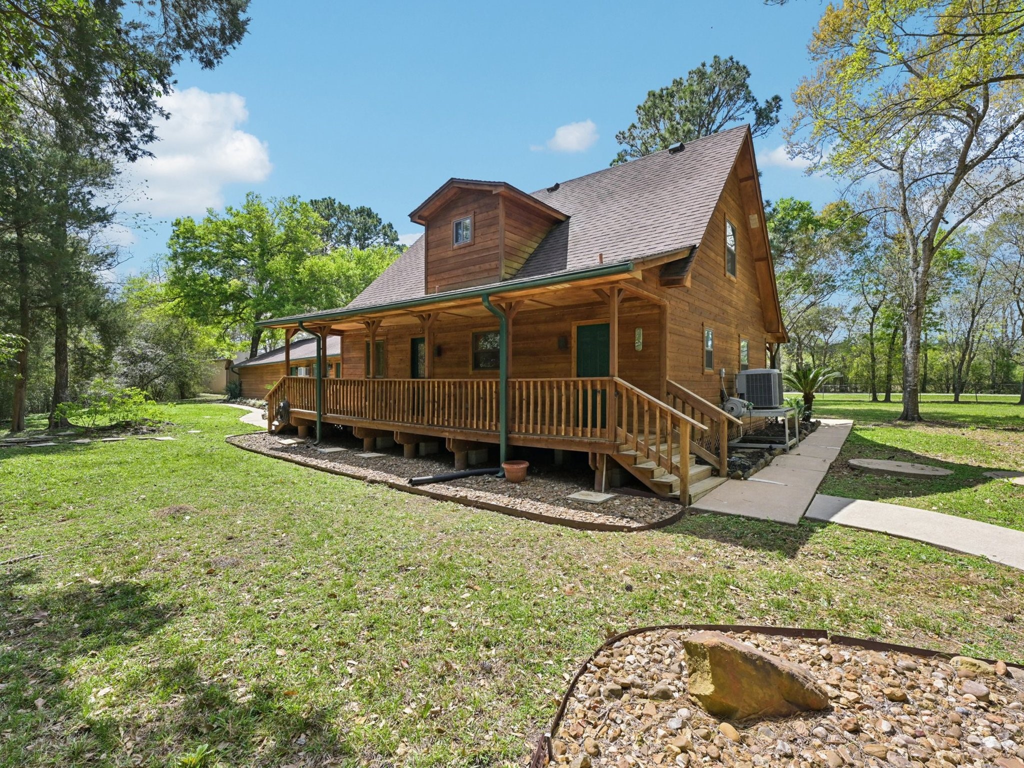Imagine enjoying a cup of coffee while overlooking the mature trees and ravine.