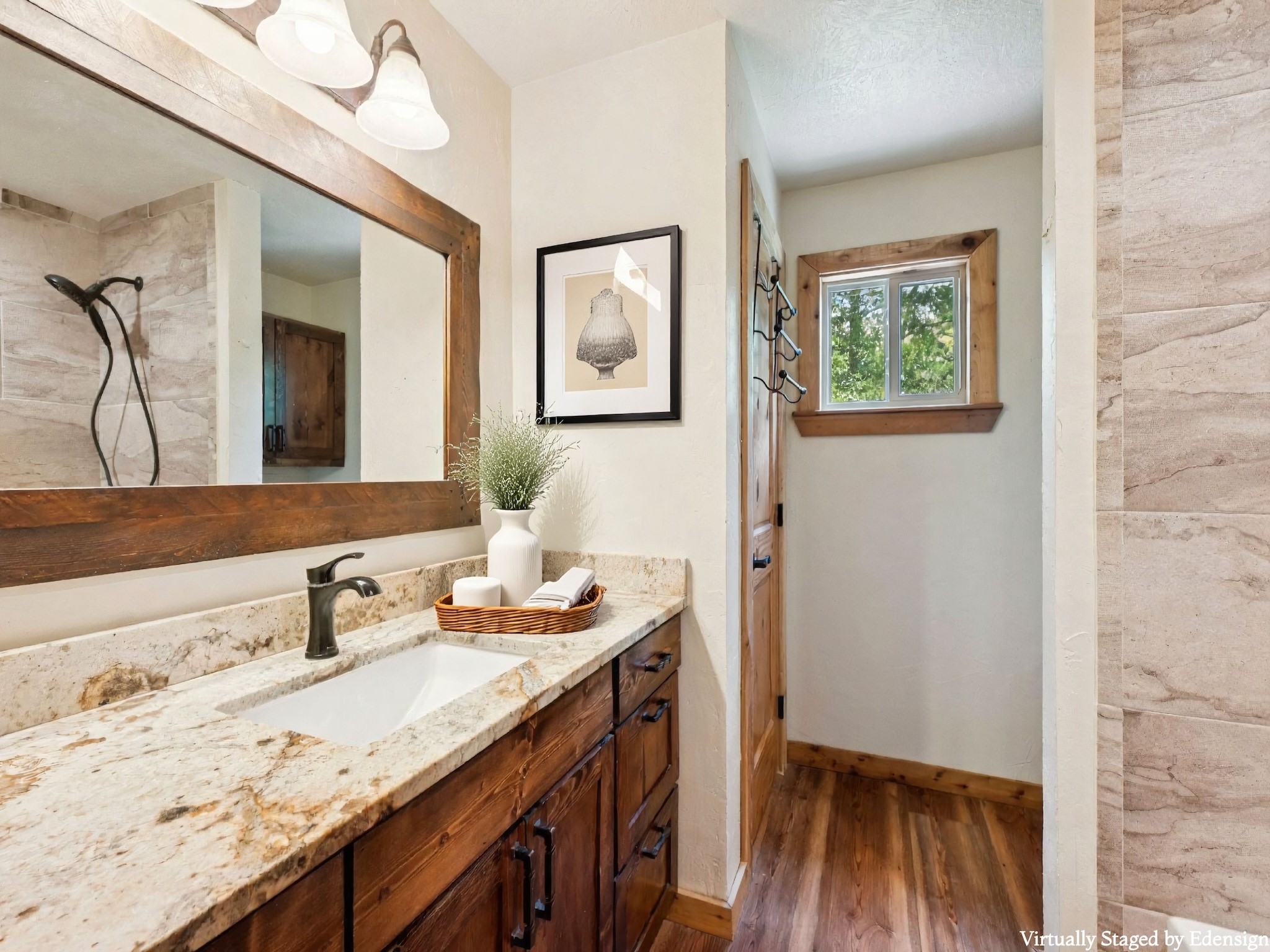 The Upstairs Bathroom also has a raised vanity and framed mirror.