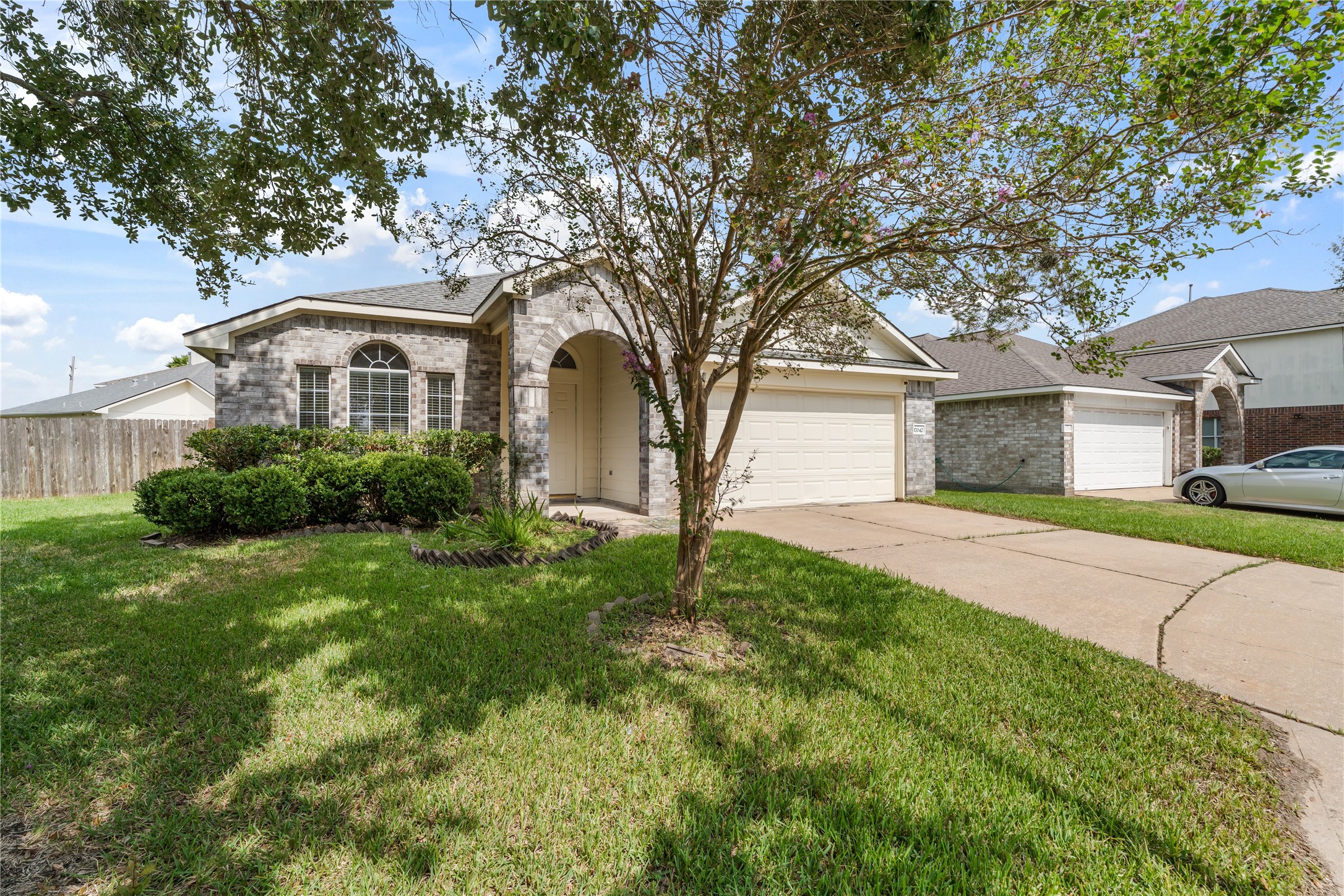 Enjoy the privacy of a cul-de-sac lot framed by mature shade trees and a spacious front yard.