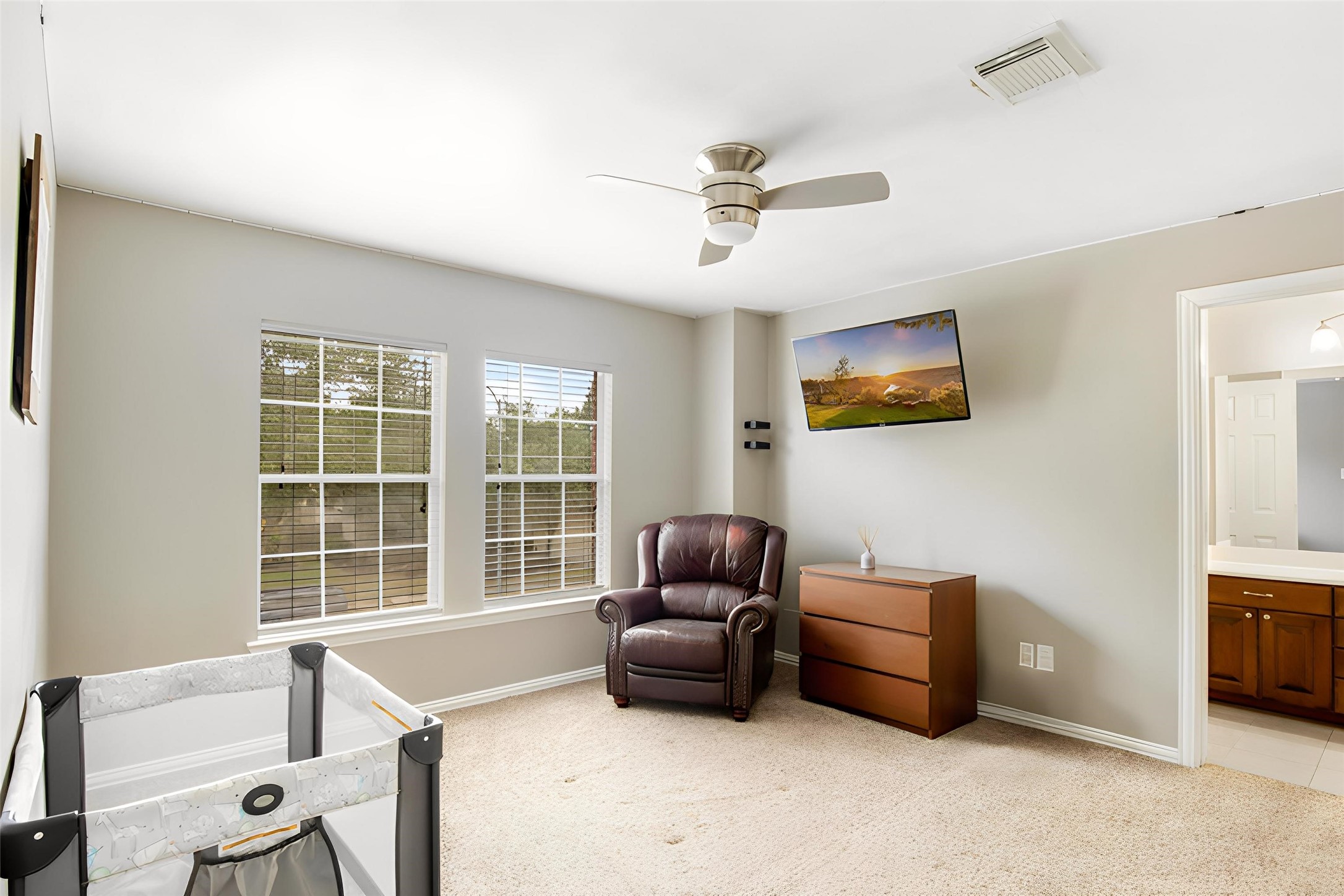 Spacious secondary bedroom with room for a bed, seating or a study area