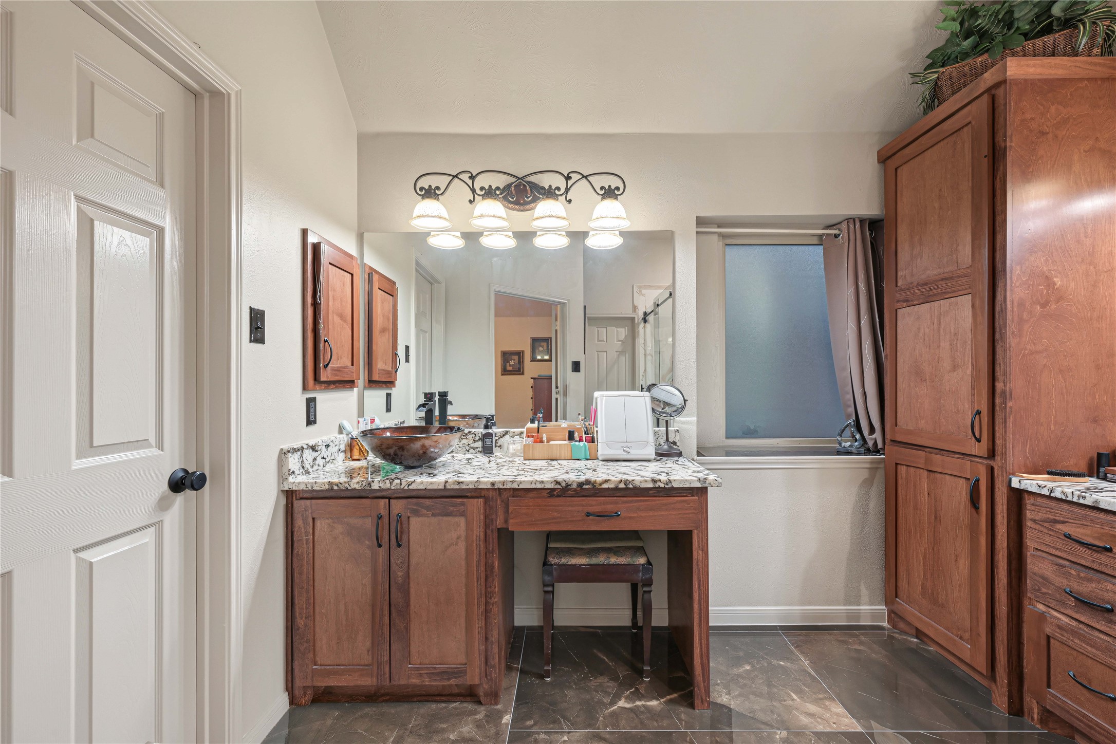 Dressing vanity with seating space