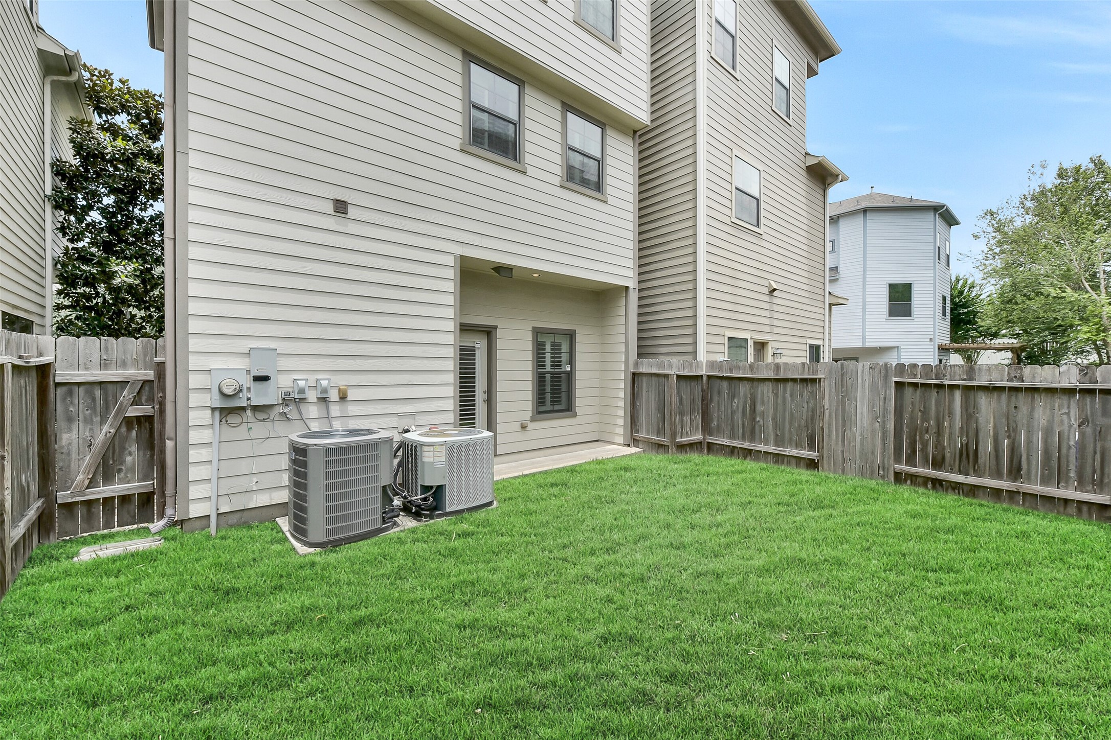 The home has a fenced back yard with a covered back patio.
