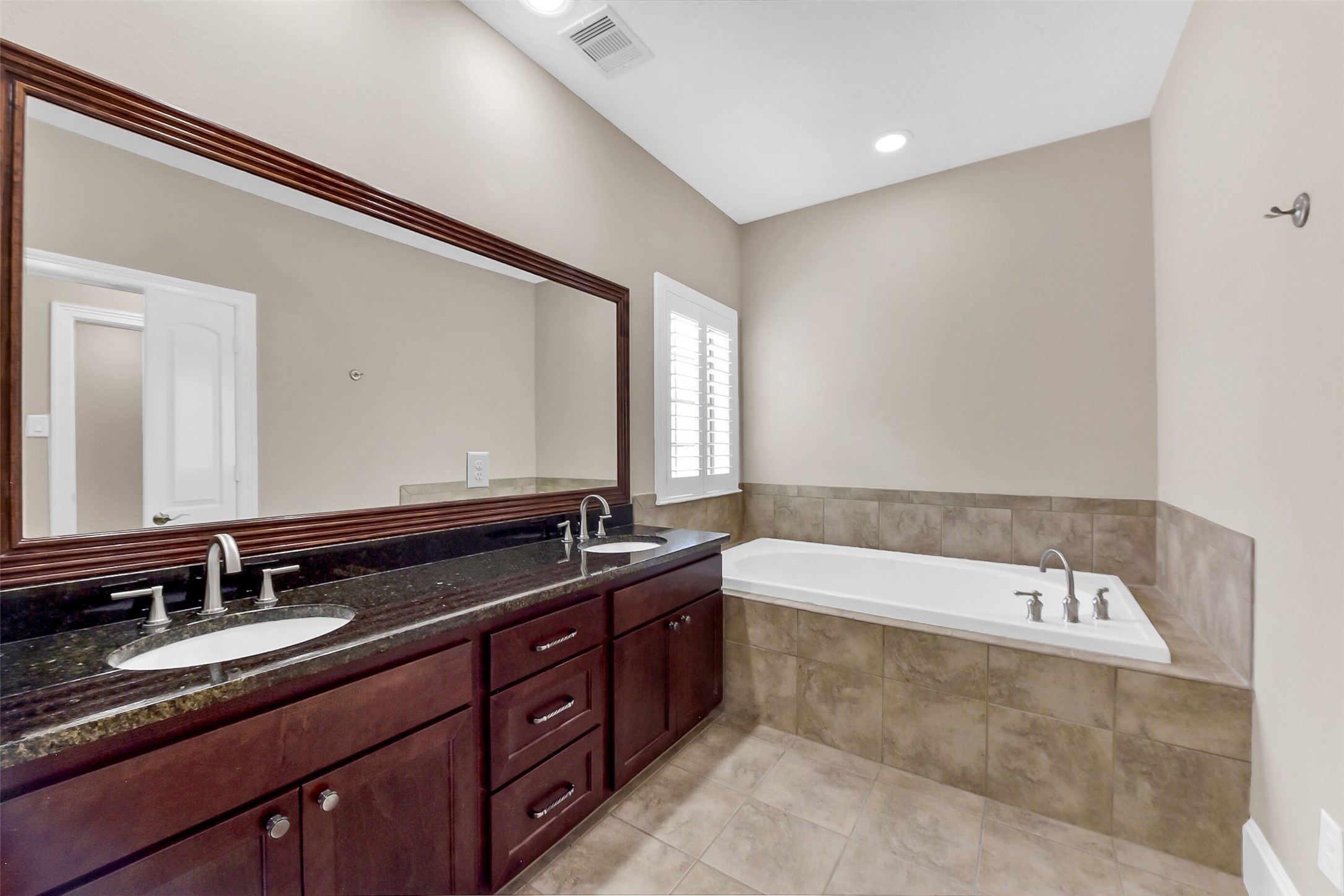 There is also a soaking tub in the primary.  You might never leave this room.