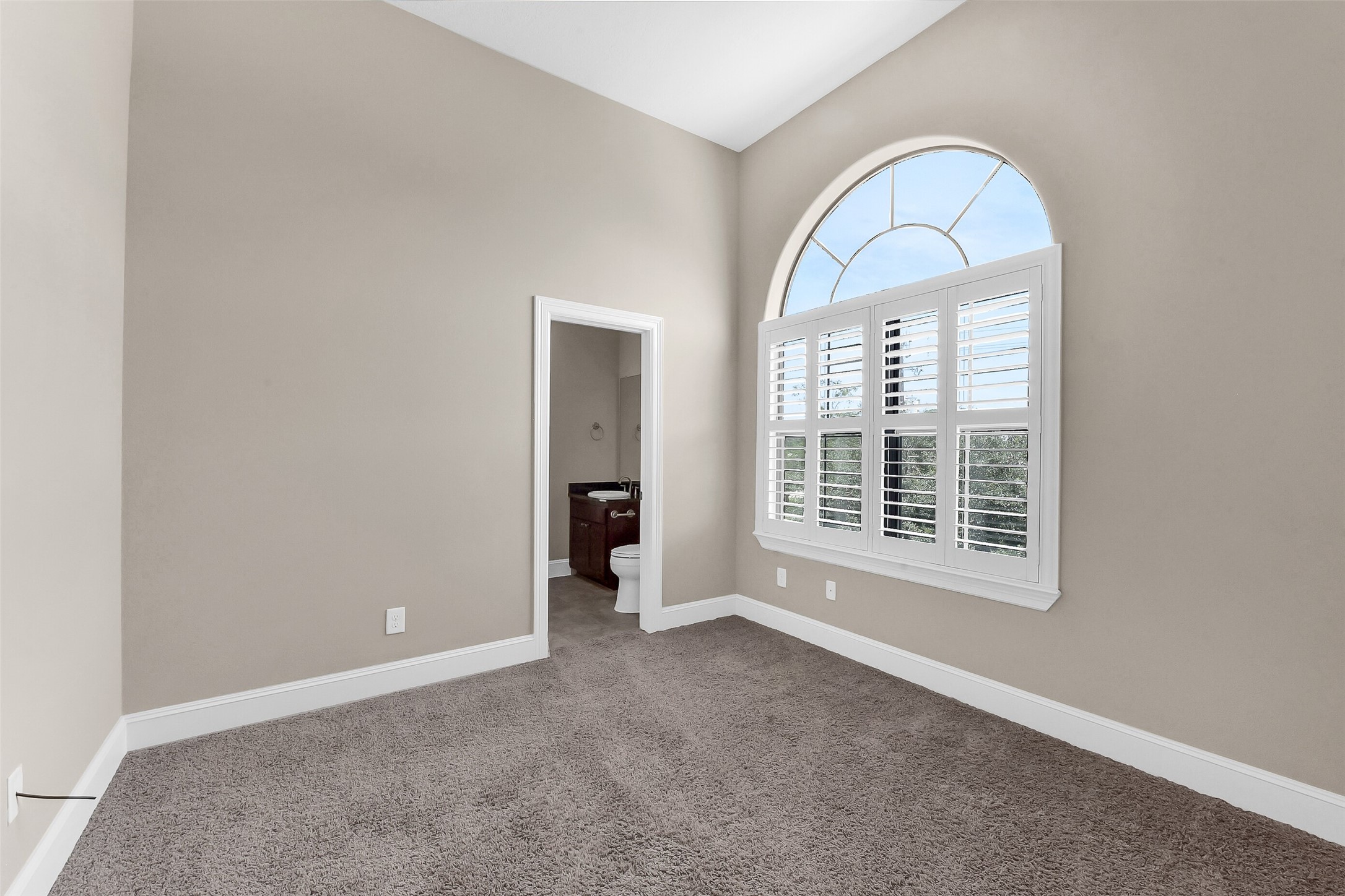 The second bedroom on the third floor with it's own private bath.