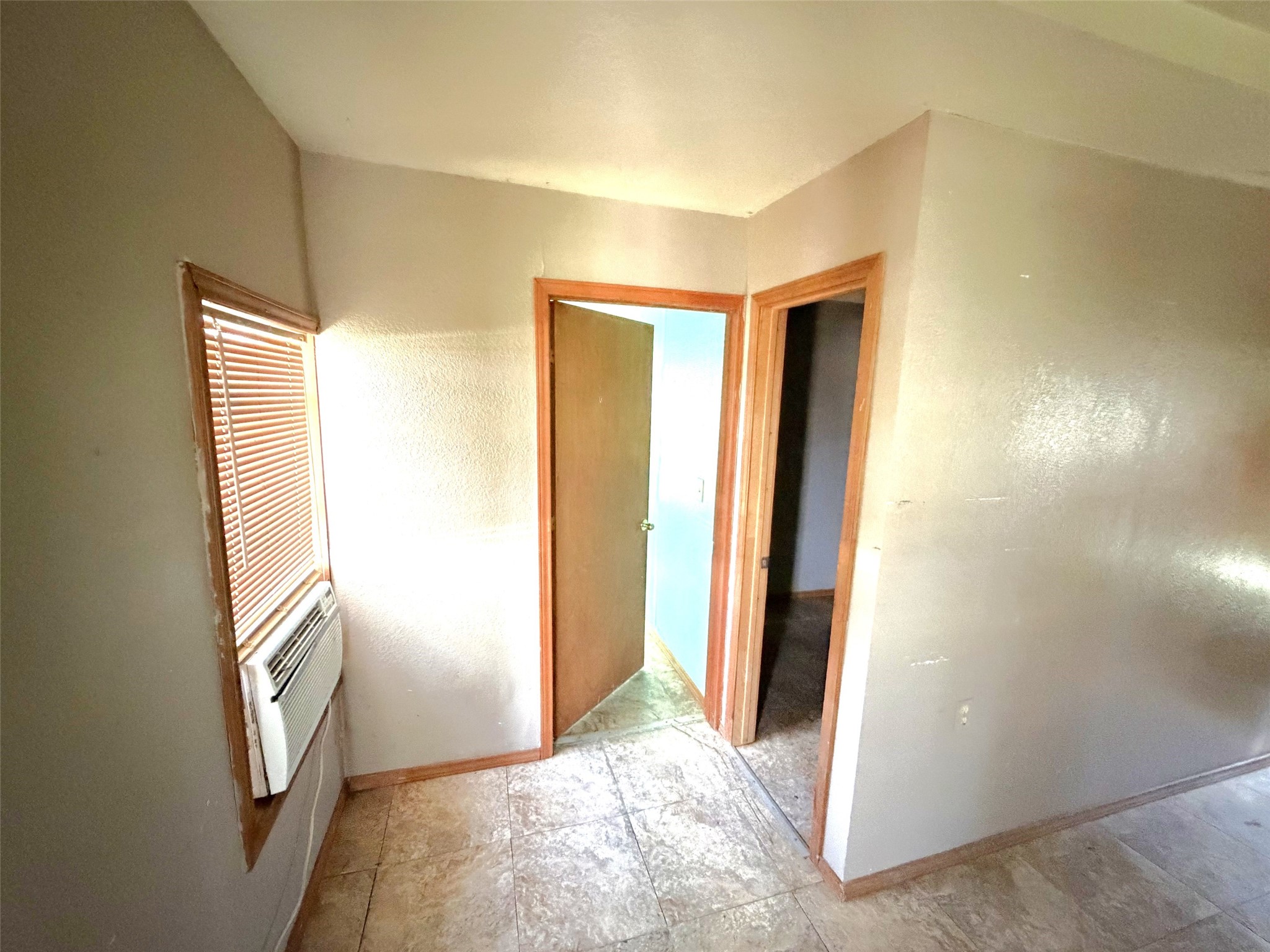 To the left of the front door are the bedrooms.