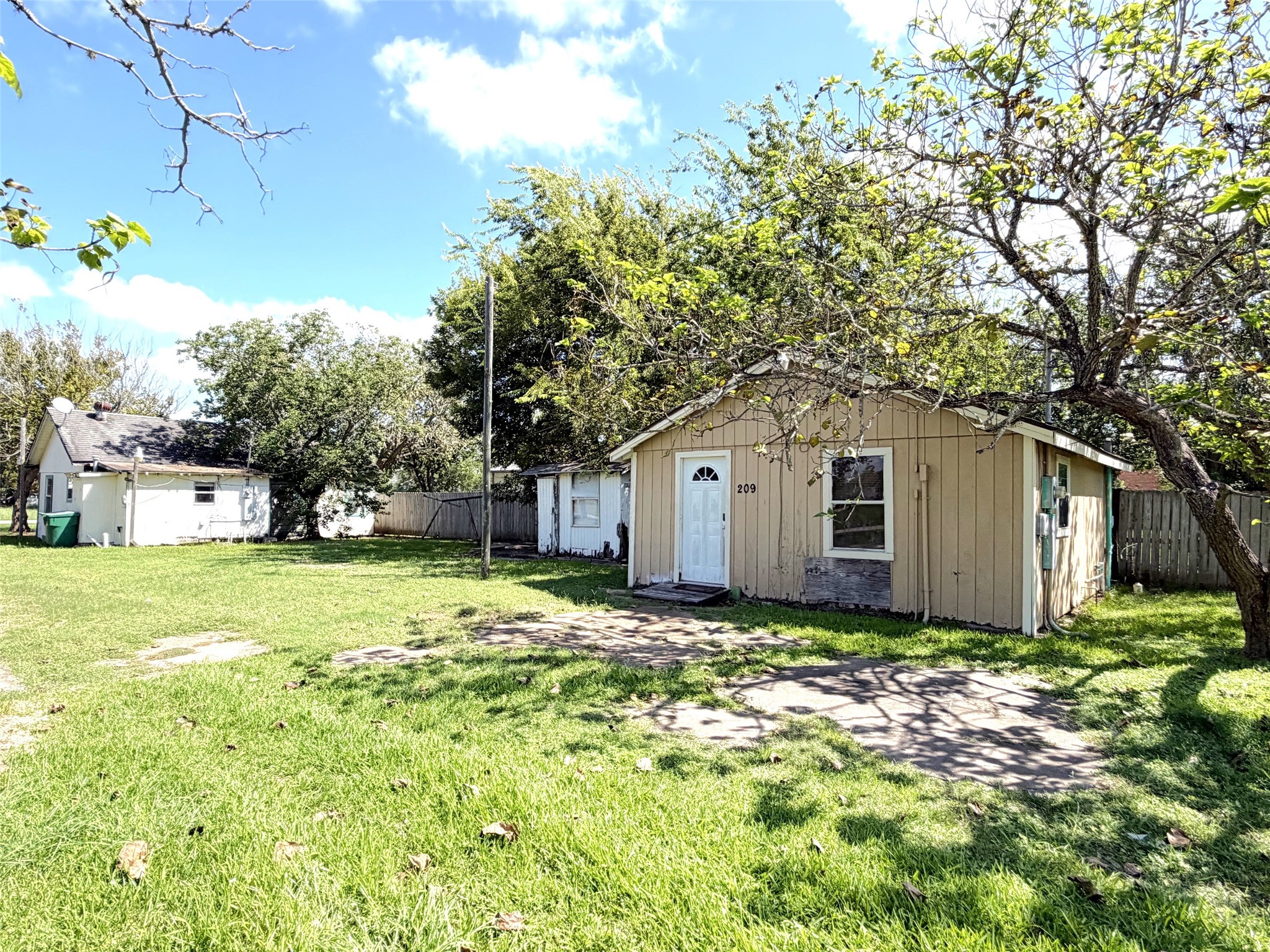 Welcome to 209 S Ave C!  This spacious corner lot hold two houses and a pad for either a third or an RV.  What a great deal!