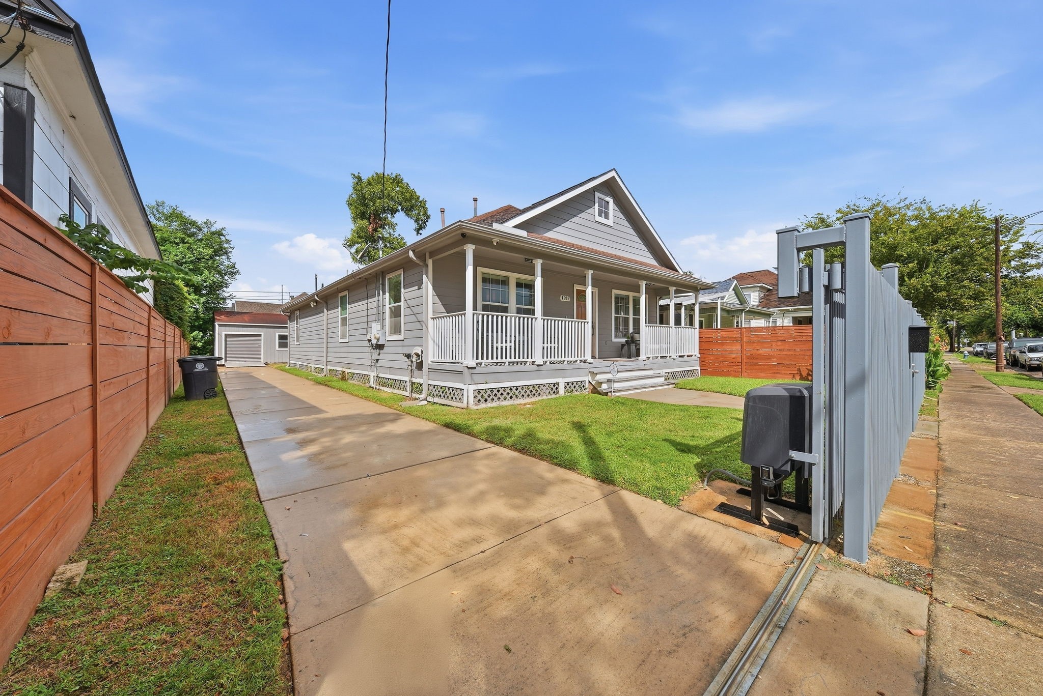 Spacious long driveway with ample parking for visitors.