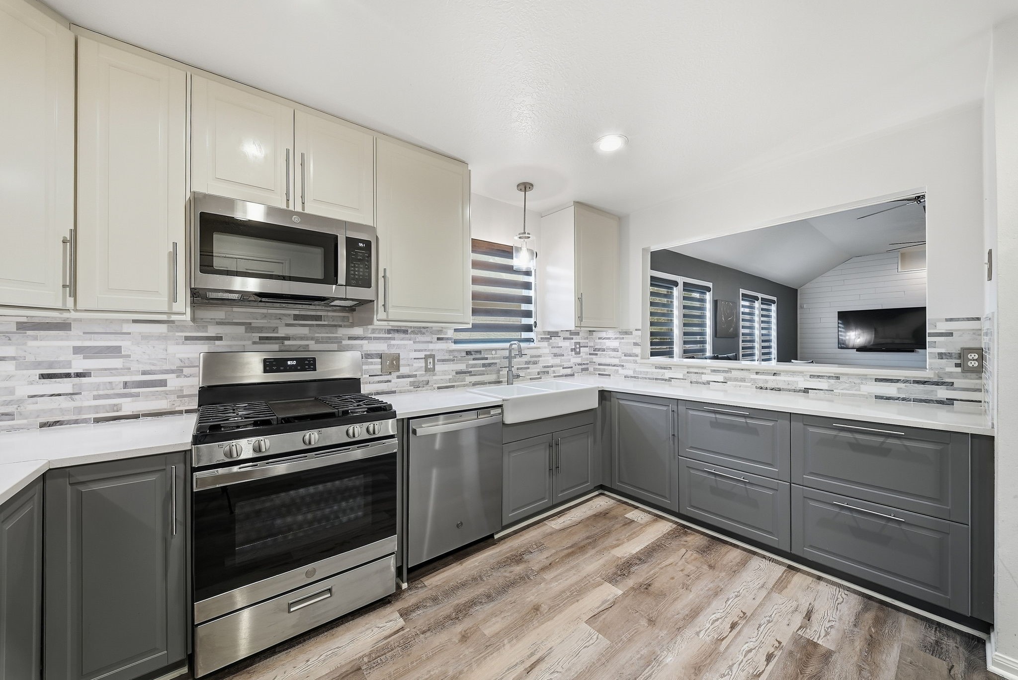 Spacious kitchen featuring an open-concept layout that flows seamlessly into the living area.
