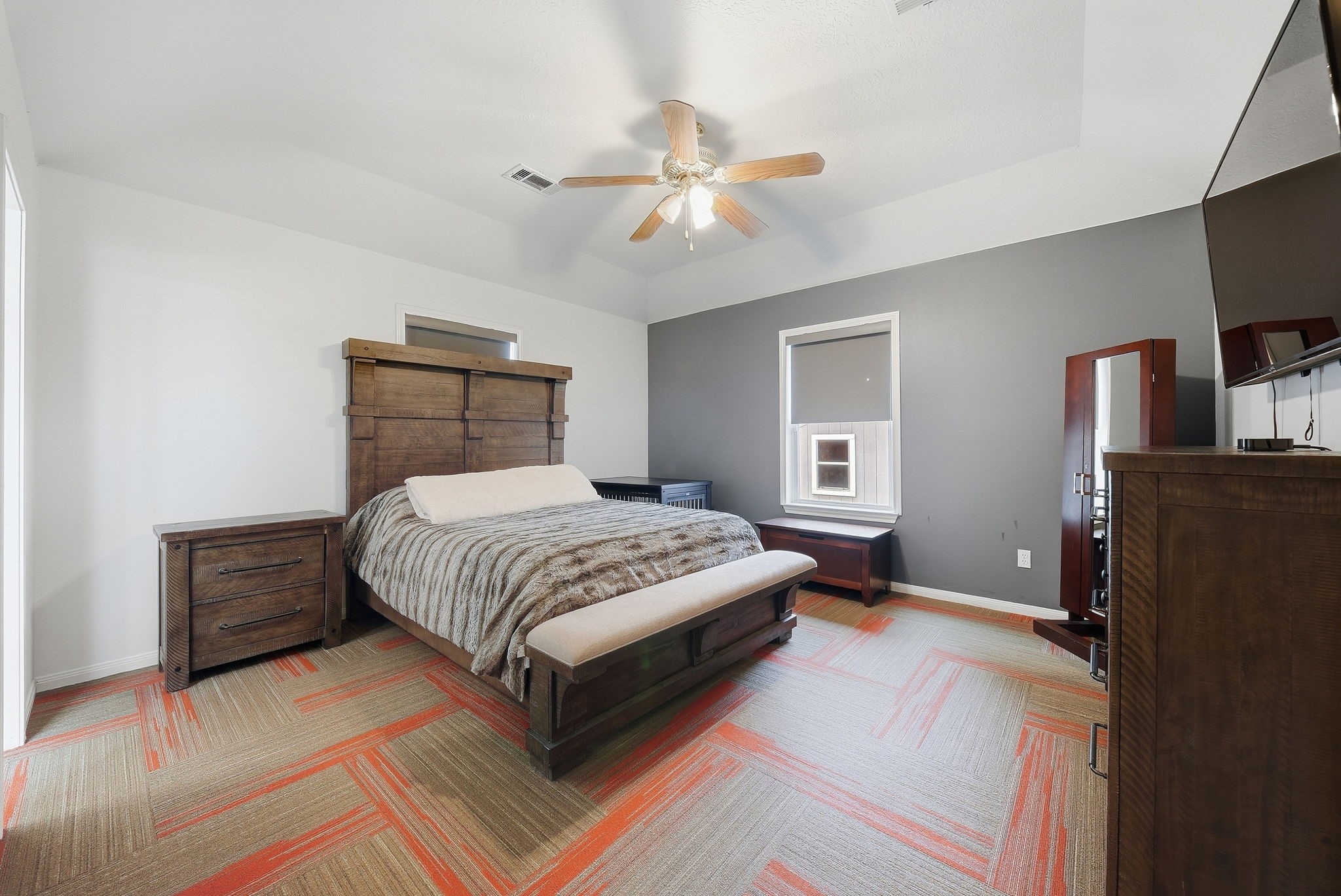 Spacious primary bedroom with ensuite full bathroom