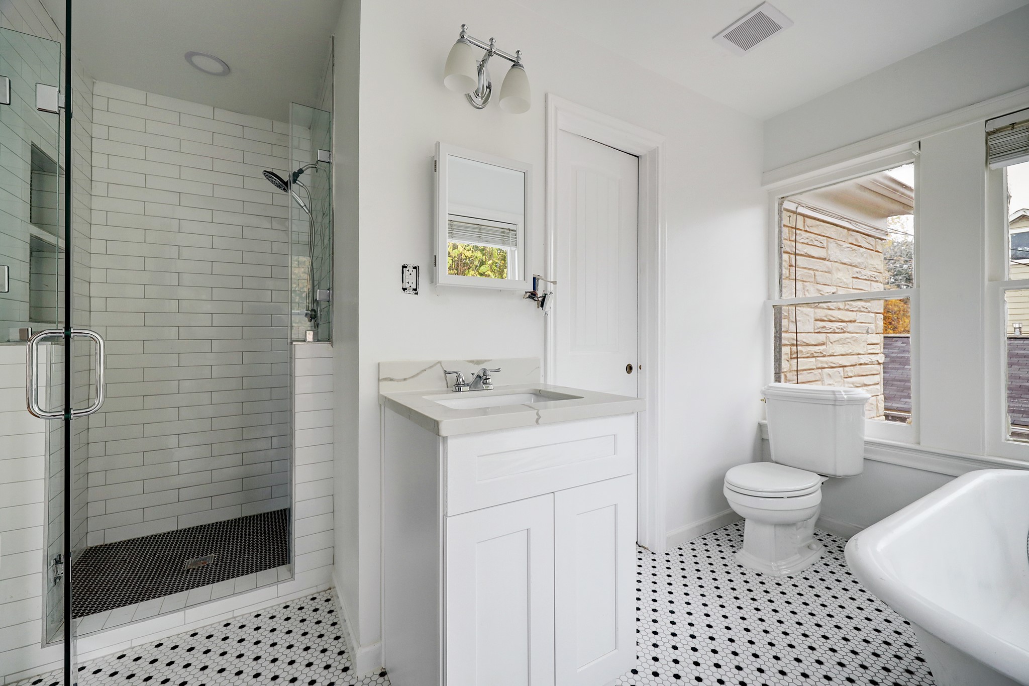 New primary bath also features walk-in shower