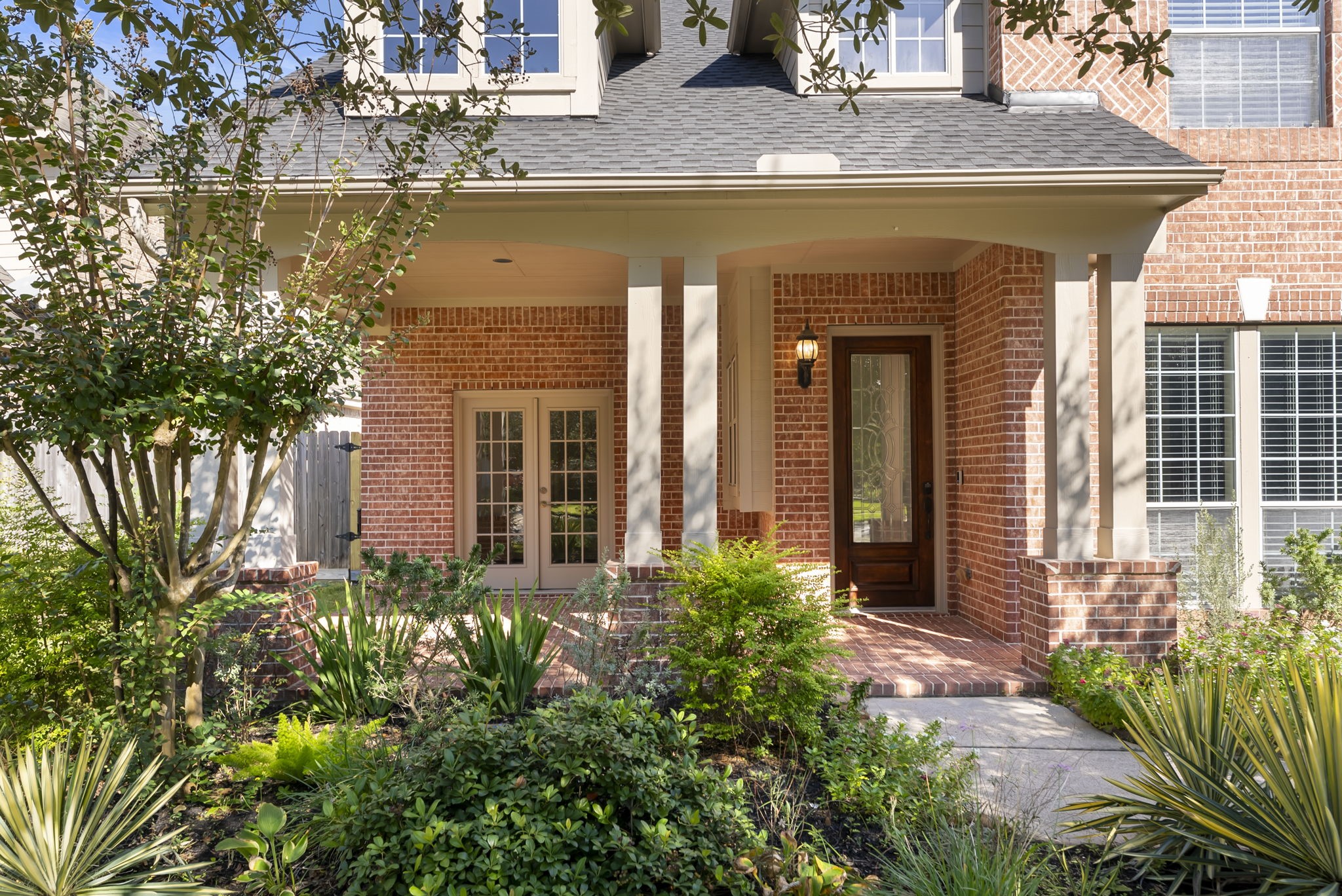 Inviting entrance with a spacious front porch.