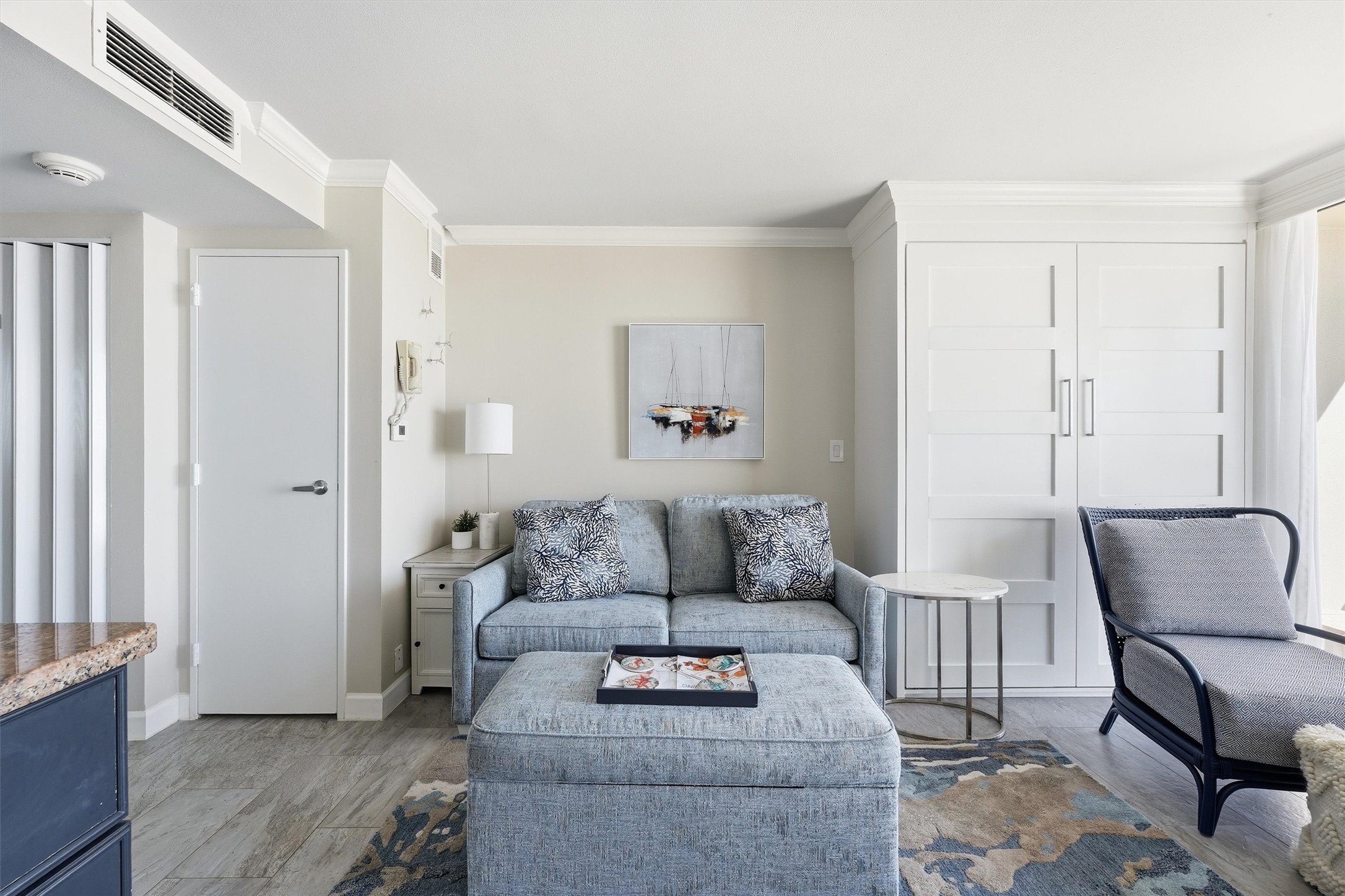 Neutral finishes and tile flooring create a light and airy coastal retreat.