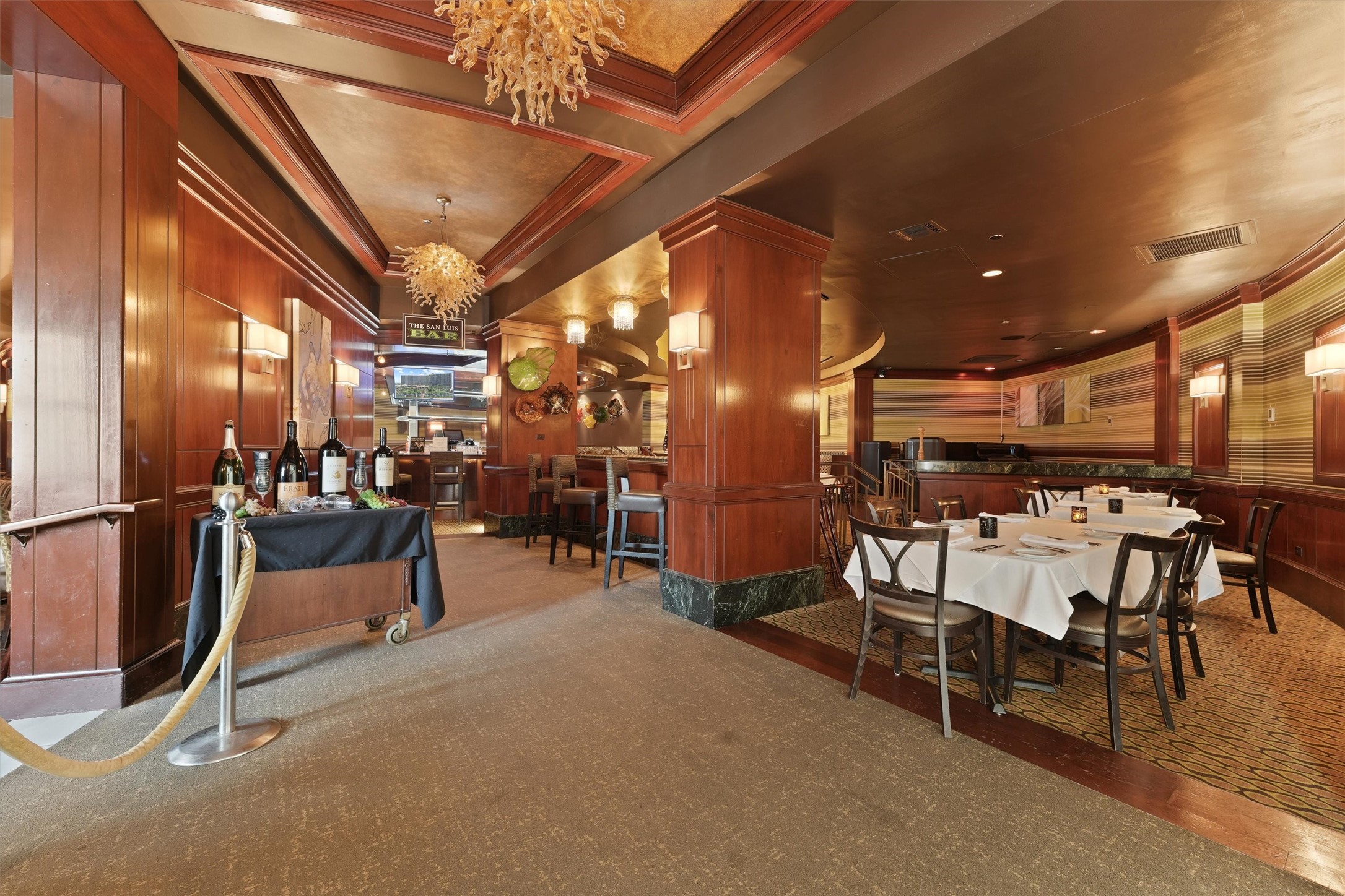 Another refined interior lounge and dining space
offers a polished setting to enjoy meals, cocktails,
or relaxed gatherings within the resort.