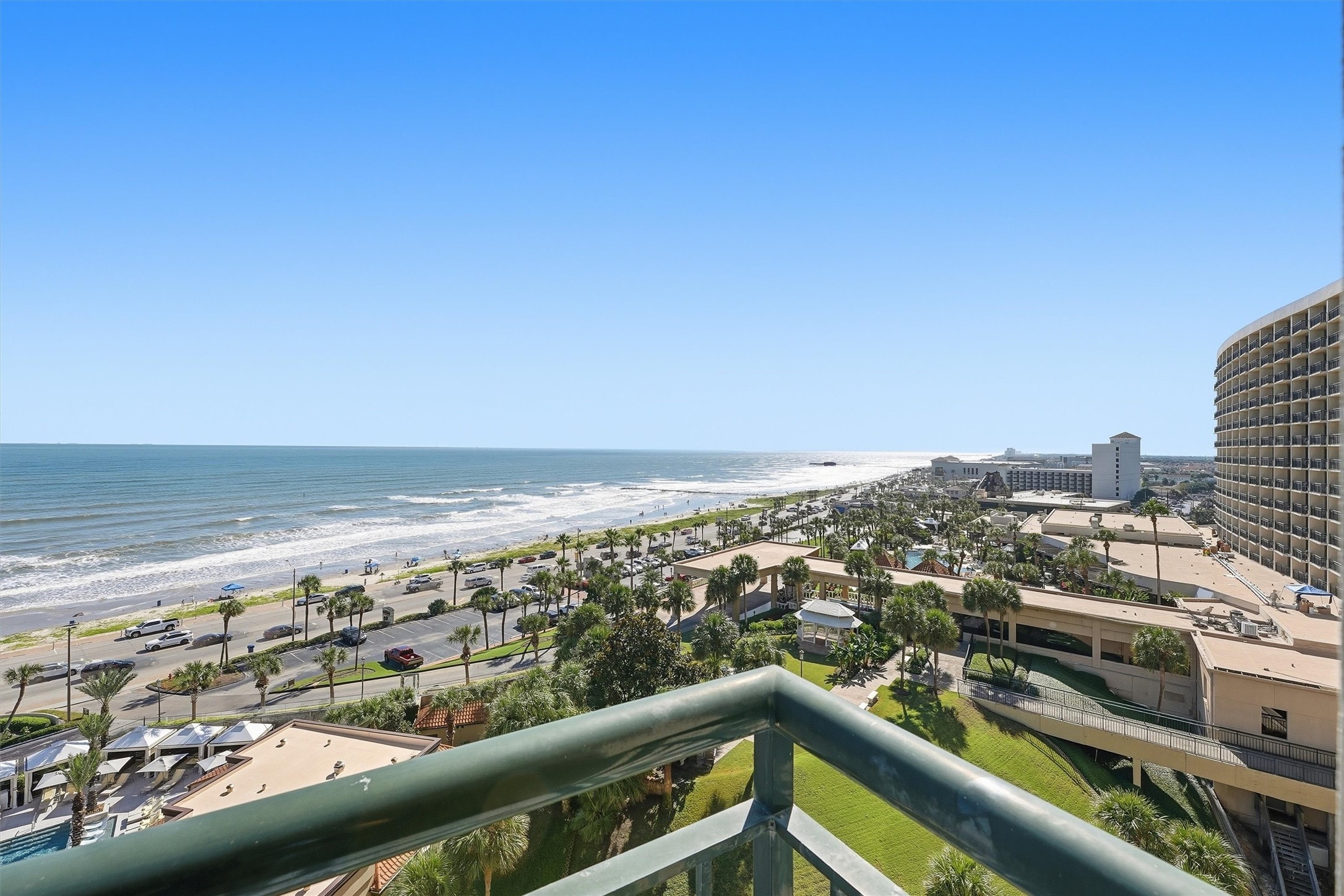 Take in the Gulf, Seawall, and palm-lined surroundings from your elevated balcony.