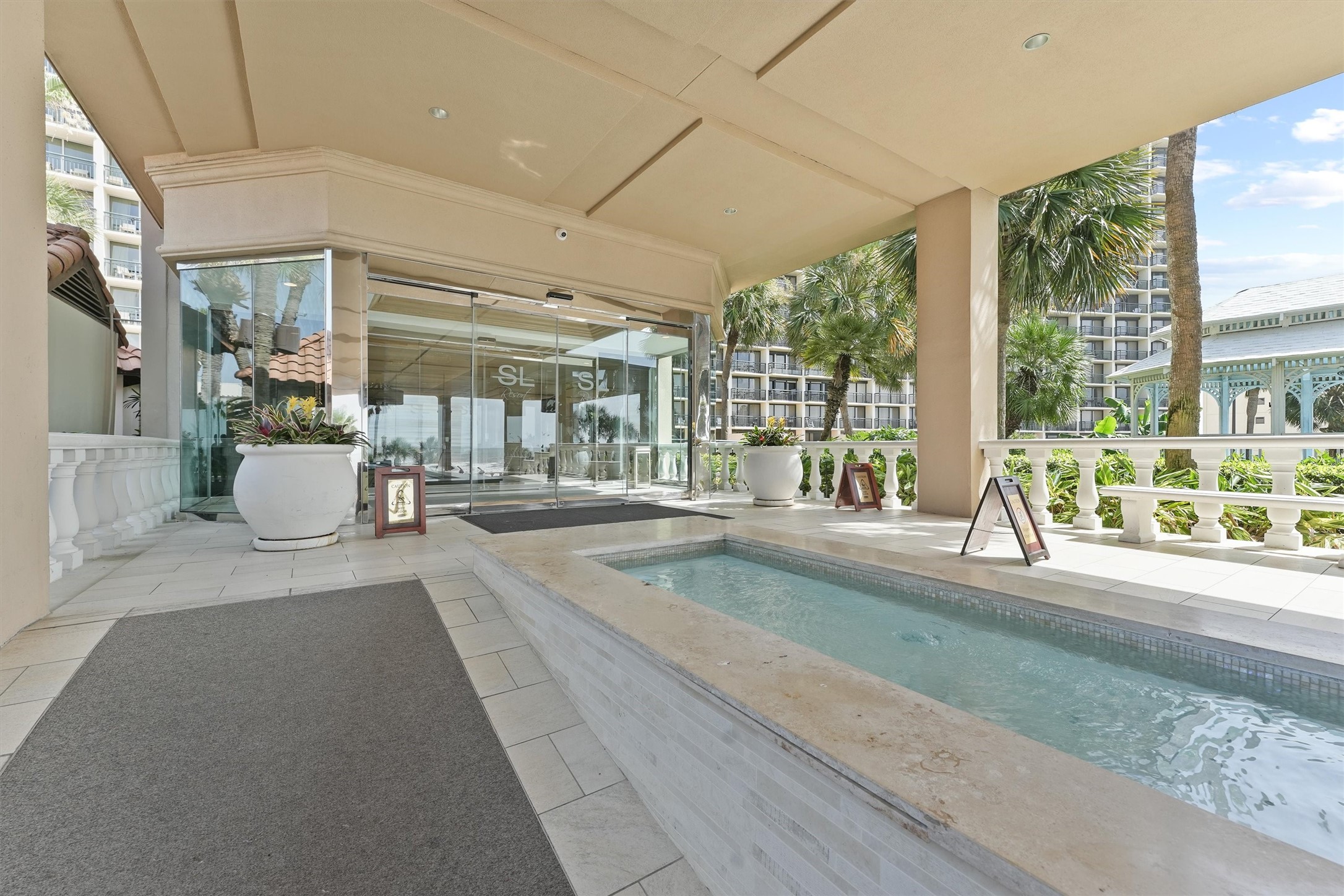 Covered walkways and thoughtfully designed commona areas provide comfortable transitions throughout the property while maintaining a polished resort feel