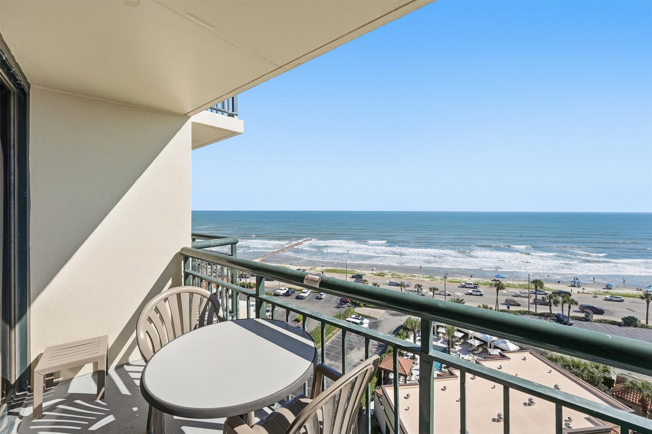 Step onto the covered balcony and take in sweeping views of the beach and Gulf.