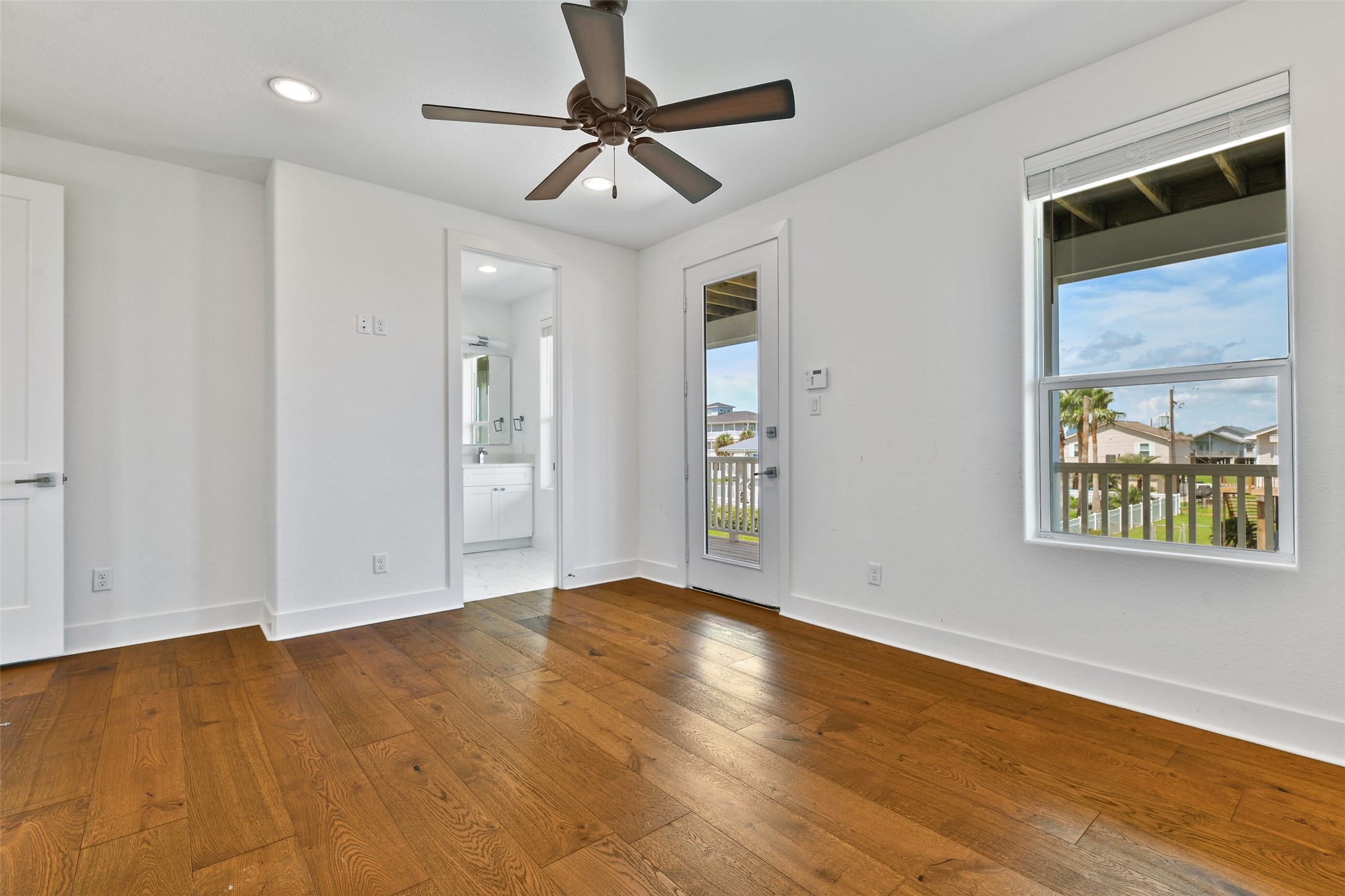 You have direct access to the deck for moring coffee from your primary bedroom.
