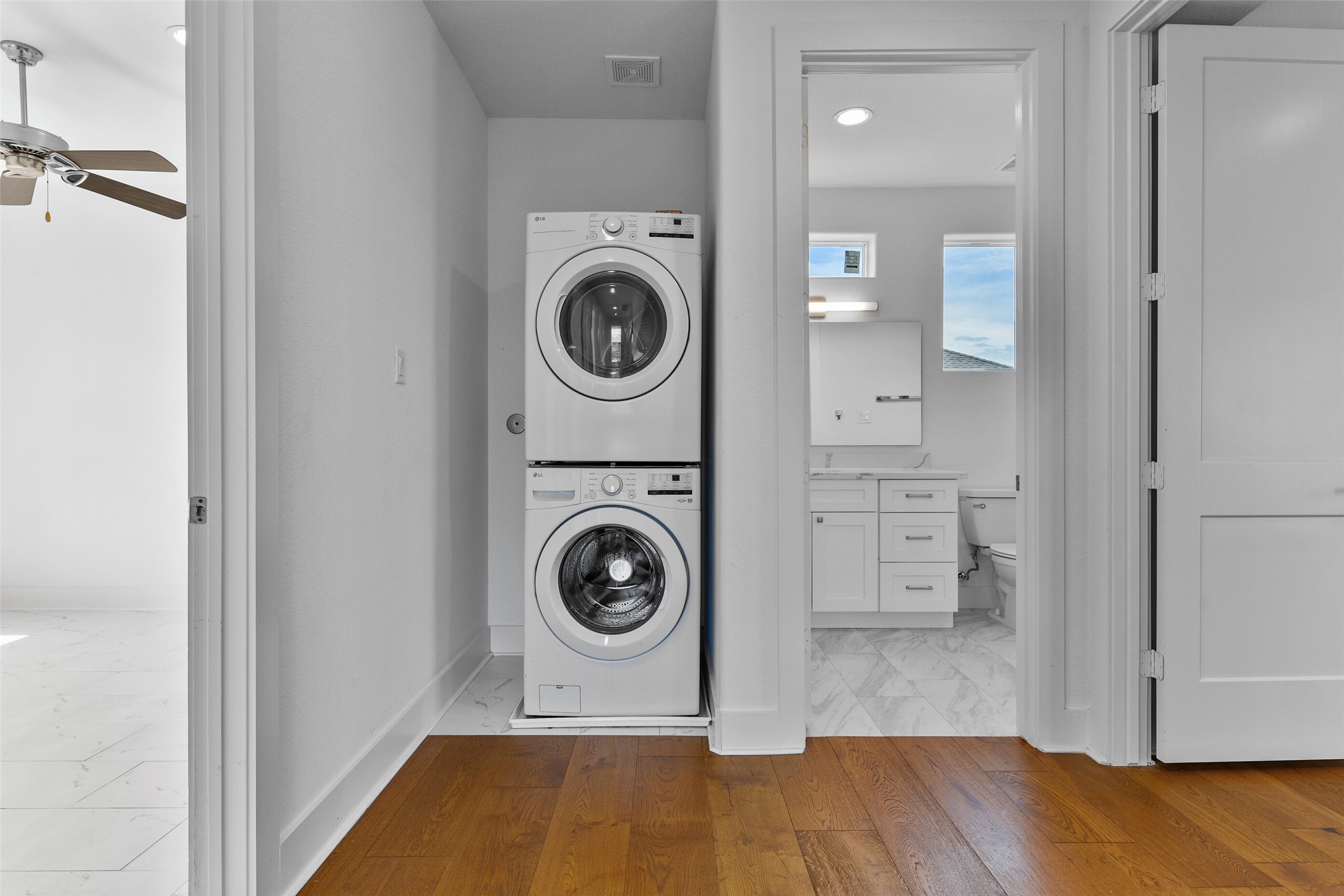 The laundry is located conveniently between all three bedrooms.