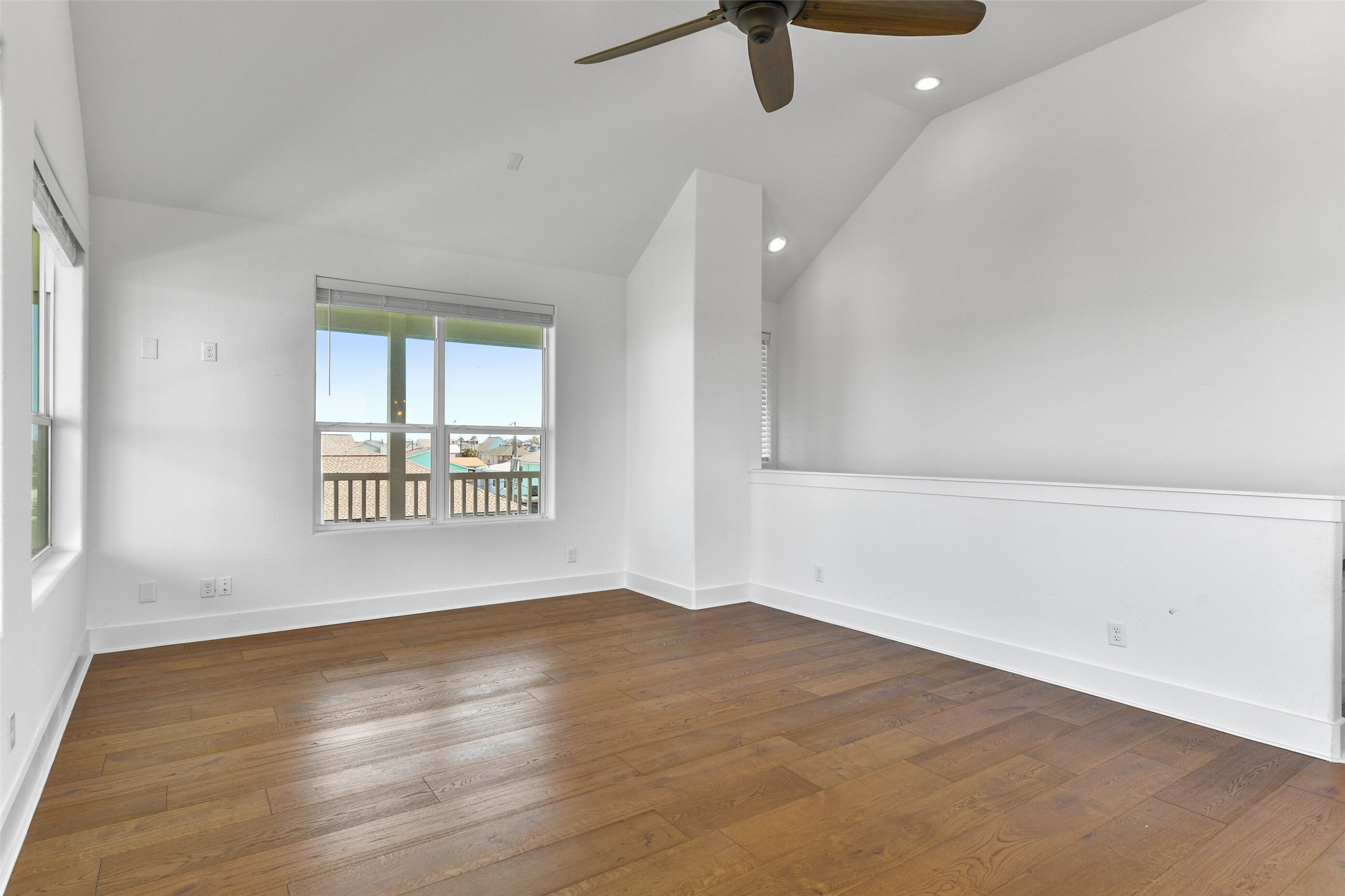 The living room is bright and airy, and has incredible ceilings.