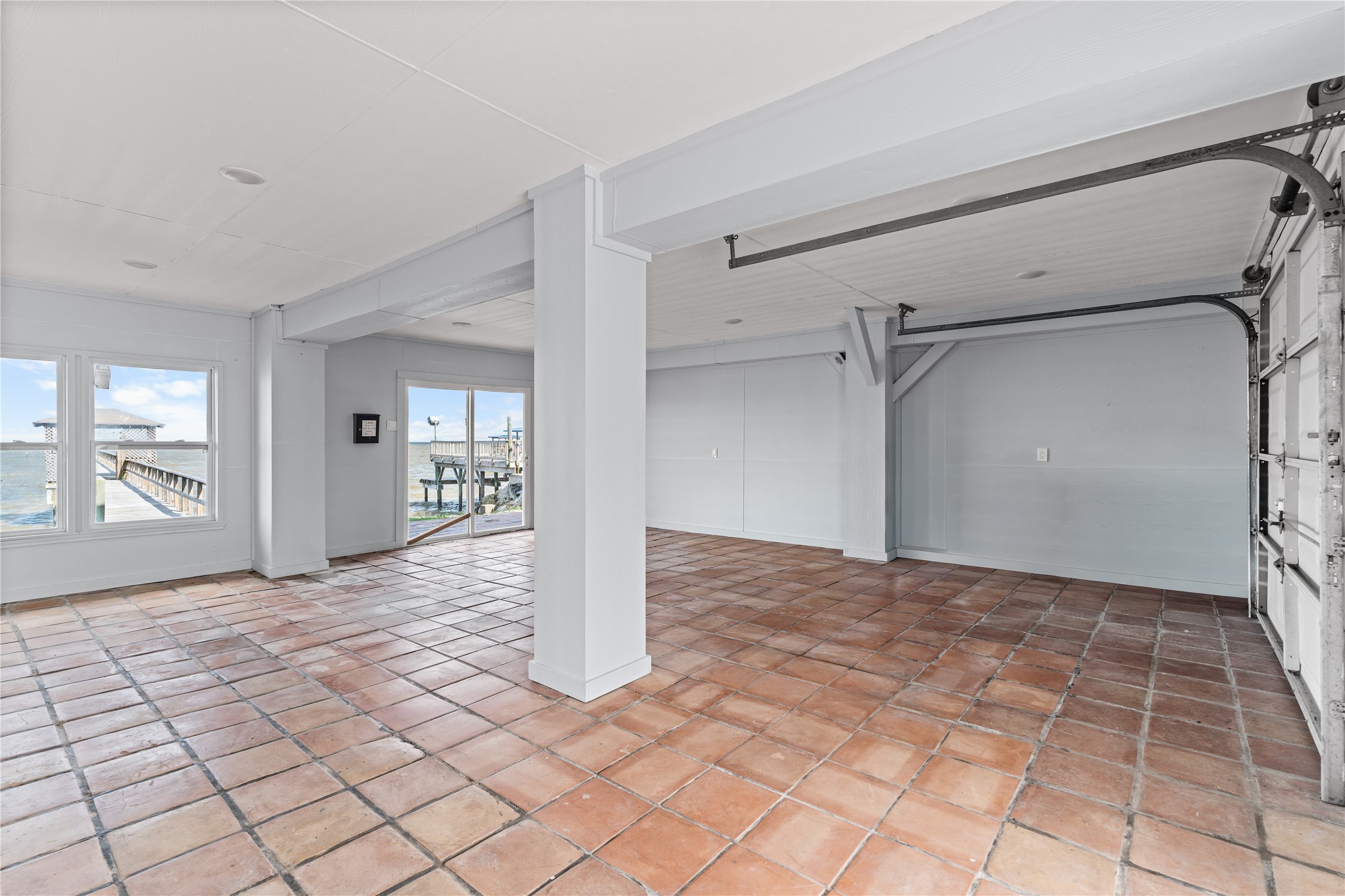 With ample room to gather, dine, and unwind, this expansive lower level offers the flexibility to function as an additional living and entertaining space while maintaining convenient access to the outdoors.