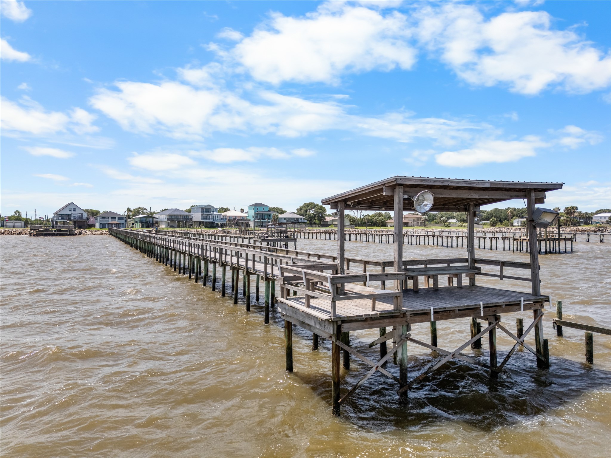 More than a pier, it's a destination. Complete with a covered sitting area, this private dock invites slow mornings, sunset conversations, and endless days on the water.