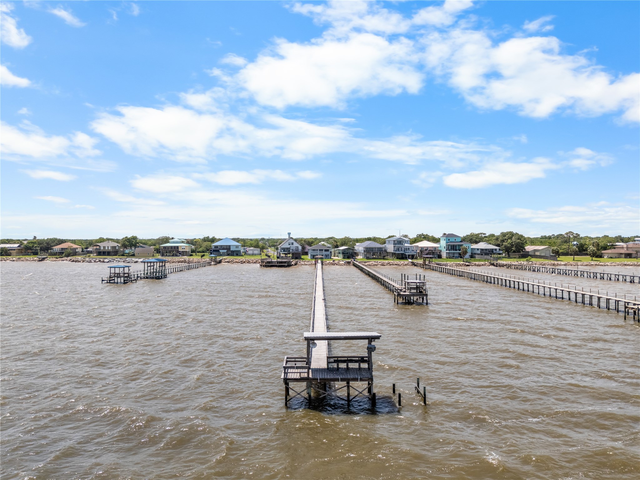 Life on the water begins at the longest pier on this side of the neighborhood.