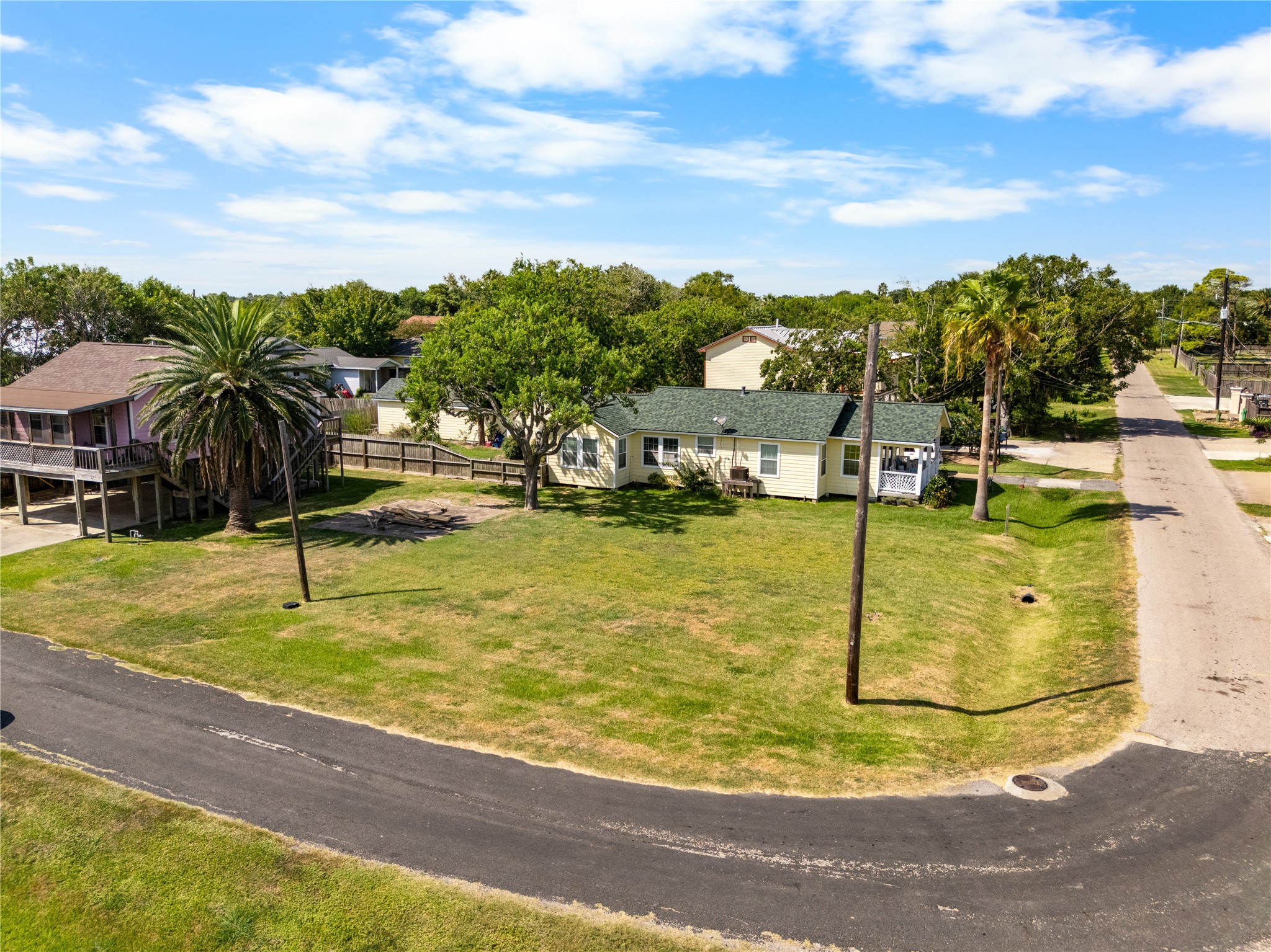 Perfect location for extra parking, a storage shed, investment property potential.