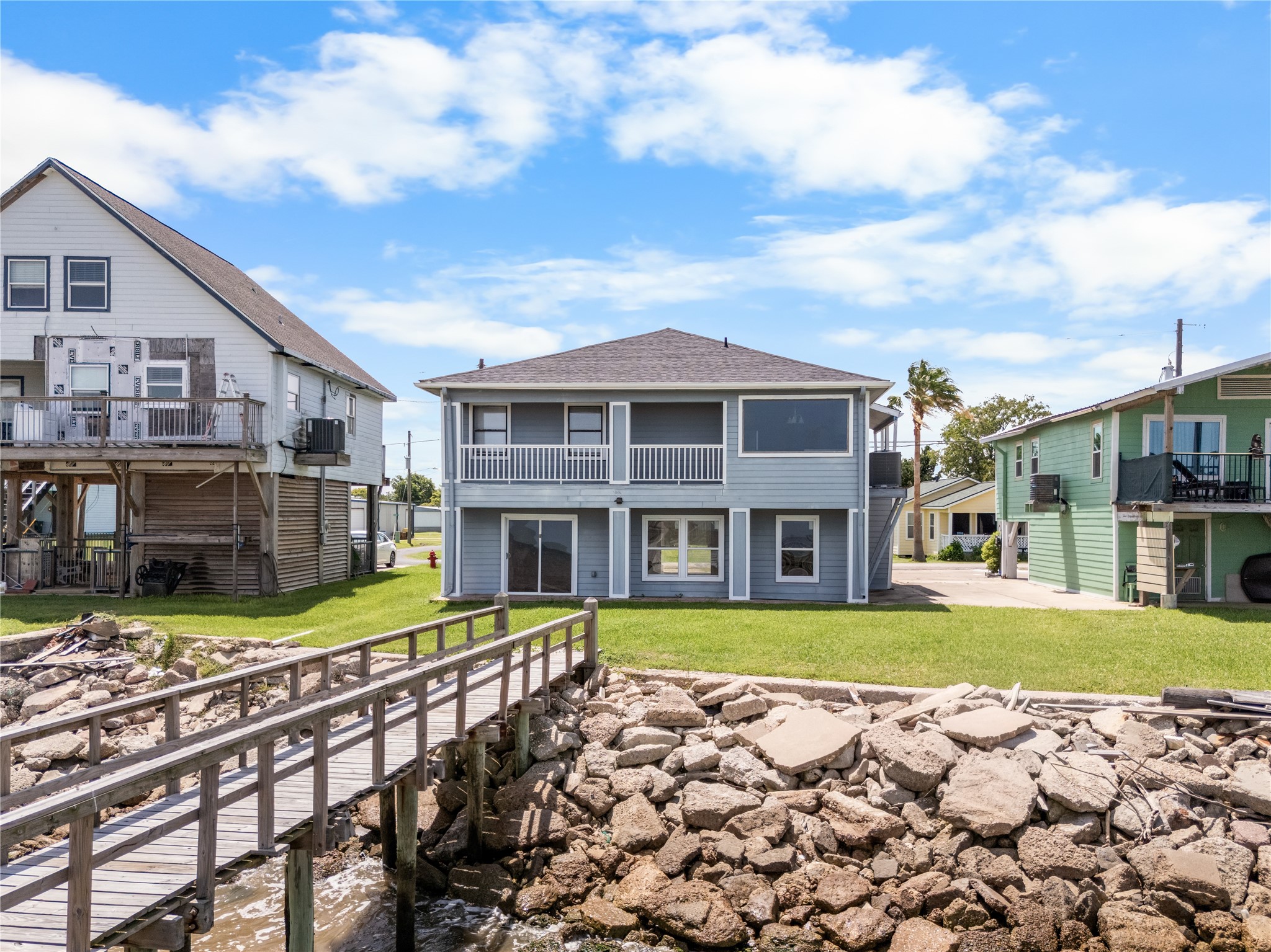 Designed to make the most of its waterfront setting, the home's elevated design pairs expansive outdoor living with uninterrupted views of the bay. Designed to make the most of its waterfront setting, the home's elevated design pairs expansive outdoor living with uninterrupted views of the bay.