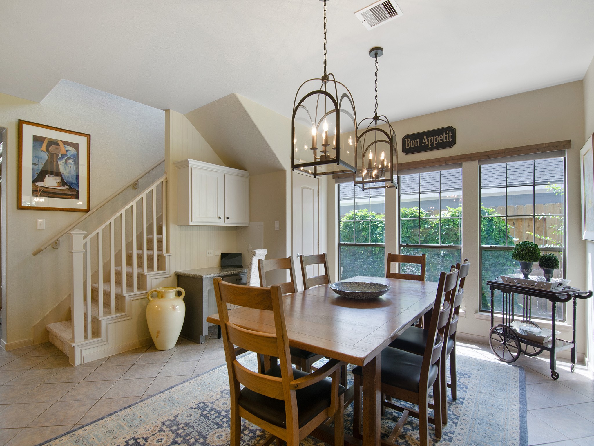 The centrally located staircase provides convenient access to the second level.