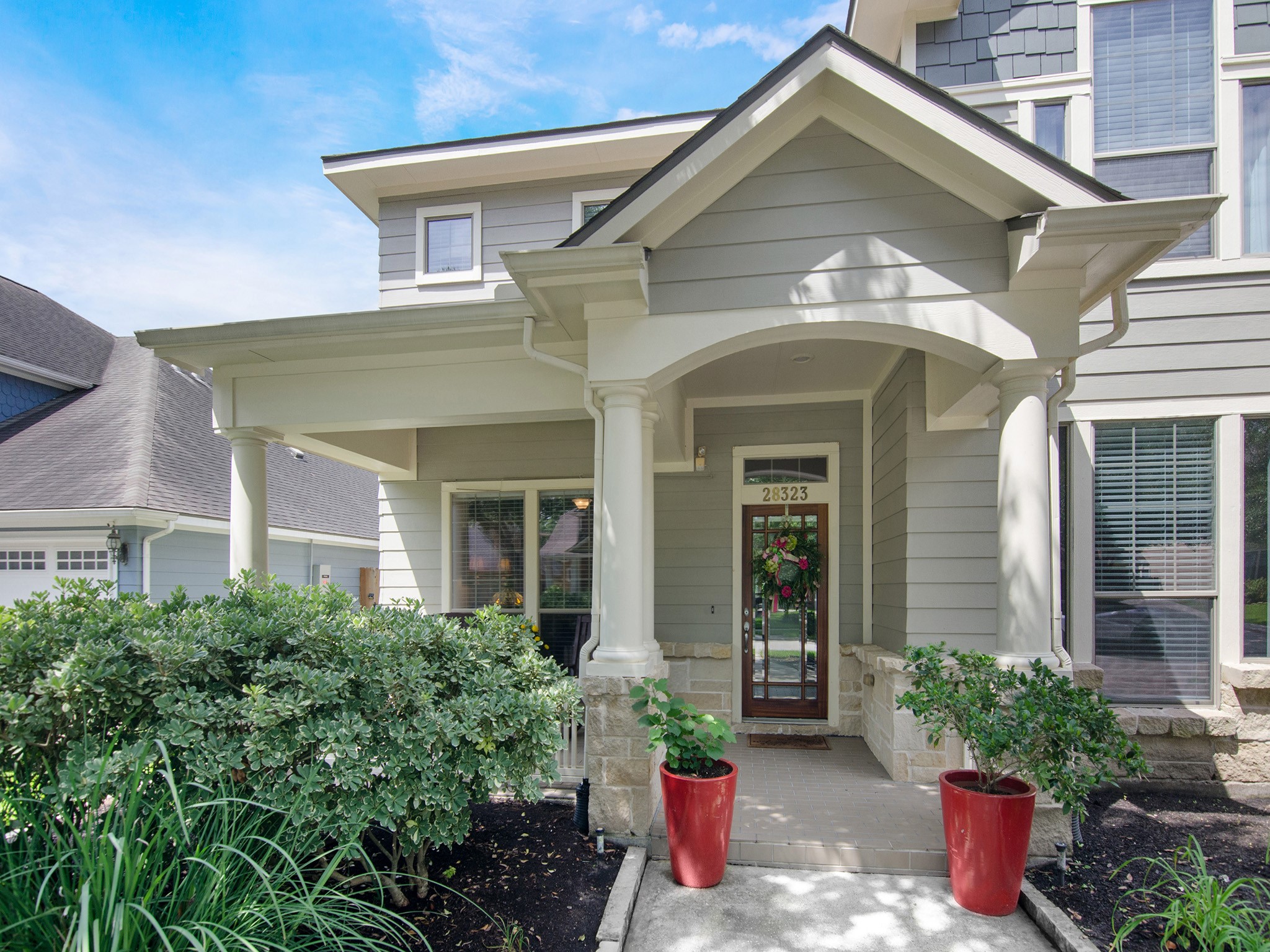 Darling Homes is known for thoughtful design, and this inviting front porch is no exception!